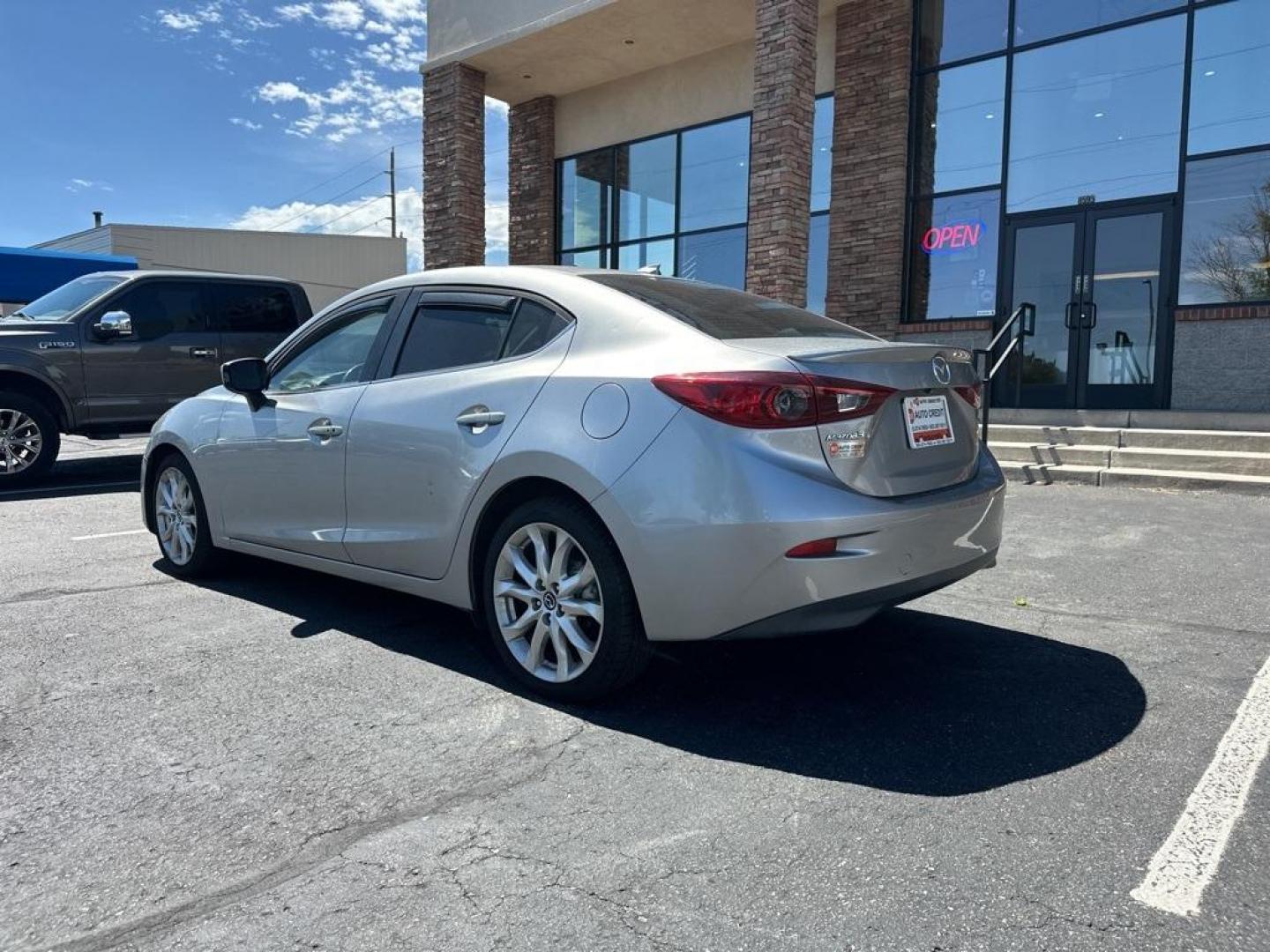 2015 Liquid Silver Metallic /Black Mazda Mazda3 s Touring (JM1BM1V30F1) with an SKYACTIV 2.5L 4-Cylinder DOHC 16V engine, Automatic transmission, located at 8595 Washington St., Thornton, CO, 80229, (303) 287-5511, 39.852348, -104.978447 - 2015 Mazda Mazda3<br><br>D1 Auto NEVER charges dealer fees! All cars have clean titles and have been inspected for mechanical issues. We have financing for everyone. Good credit, bad credit, first time buyers.<br><br>Please call Lakewood Location 303-274-7692 or Thornton 303-287-5511 to schedule a t - Photo#7