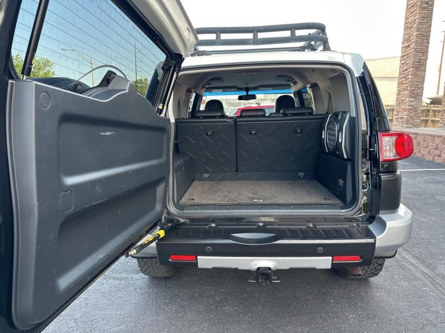 2010 Black /Dark Charcoal Toyota FJ Cruiser Upgade Package 2 (JTEBU4BF7AK) with an 4.0L V6 DOHC VVT-i 24V engine, Automatic transmission, located at 8595 Washington St., Thornton, CO, 80229, (303) 287-5511, 39.852348, -104.978447 - Toyota FJ Cruiser ONE OWNER in near mint condition with ZERO signs of abuse or off roading!! With upgade package 2 that includes, locking rear diff, 9 speaker audio and more. One owner and completley stock and never abused. Condition is everything and you wont find a cleaner one. Odometer is 87309 m - Photo#17