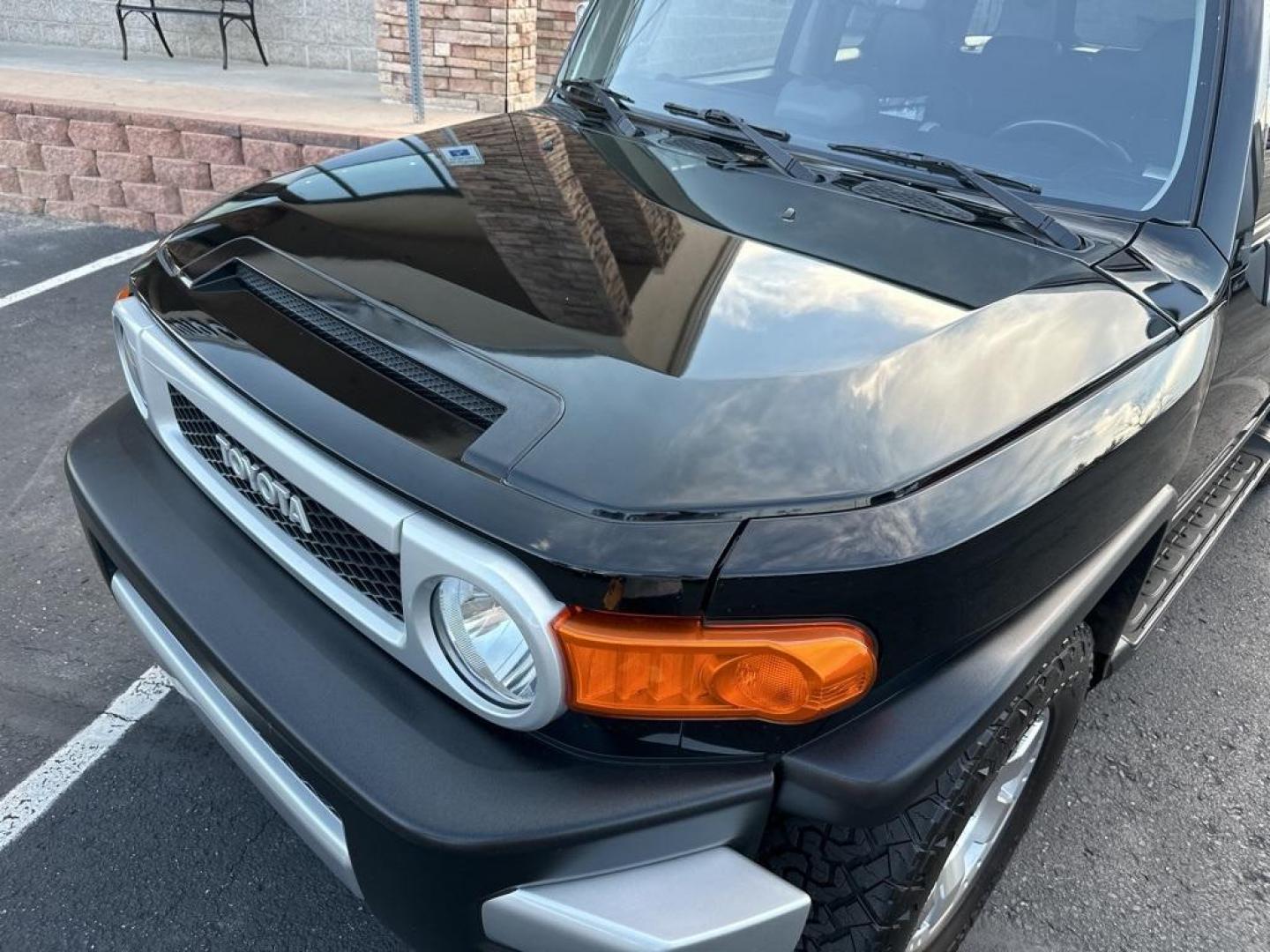 2010 Black /Dark Charcoal Toyota FJ Cruiser Upgade Package 2 (JTEBU4BF7AK) with an 4.0L V6 DOHC VVT-i 24V engine, Automatic transmission, located at 8595 Washington St., Thornton, CO, 80229, (303) 287-5511, 39.852348, -104.978447 - Toyota FJ Cruiser ONE OWNER in near mint condition with ZERO signs of abuse or off roading!! With upgade package 2 that includes, locking rear diff, 9 speaker audio and more. One owner and completley stock and never abused. Condition is everything and you wont find a cleaner one. Odometer is 87309 m - Photo#32