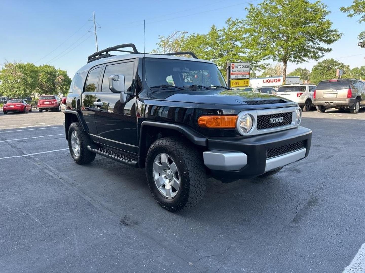 2010 Black /Dark Charcoal Toyota FJ Cruiser Upgade Package 2 (JTEBU4BF7AK) with an 4.0L V6 DOHC VVT-i 24V engine, Automatic transmission, located at 8595 Washington St., Thornton, CO, 80229, (303) 287-5511, 39.852348, -104.978447 - Toyota FJ Cruiser ONE OWNER in near mint condition with ZERO signs of abuse or off roading!! With upgade package 2 that includes, locking rear diff, 9 speaker audio and more. One owner and completley stock and never abused. Condition is everything and you wont find a cleaner one. Odometer is 87309 m - Photo#3