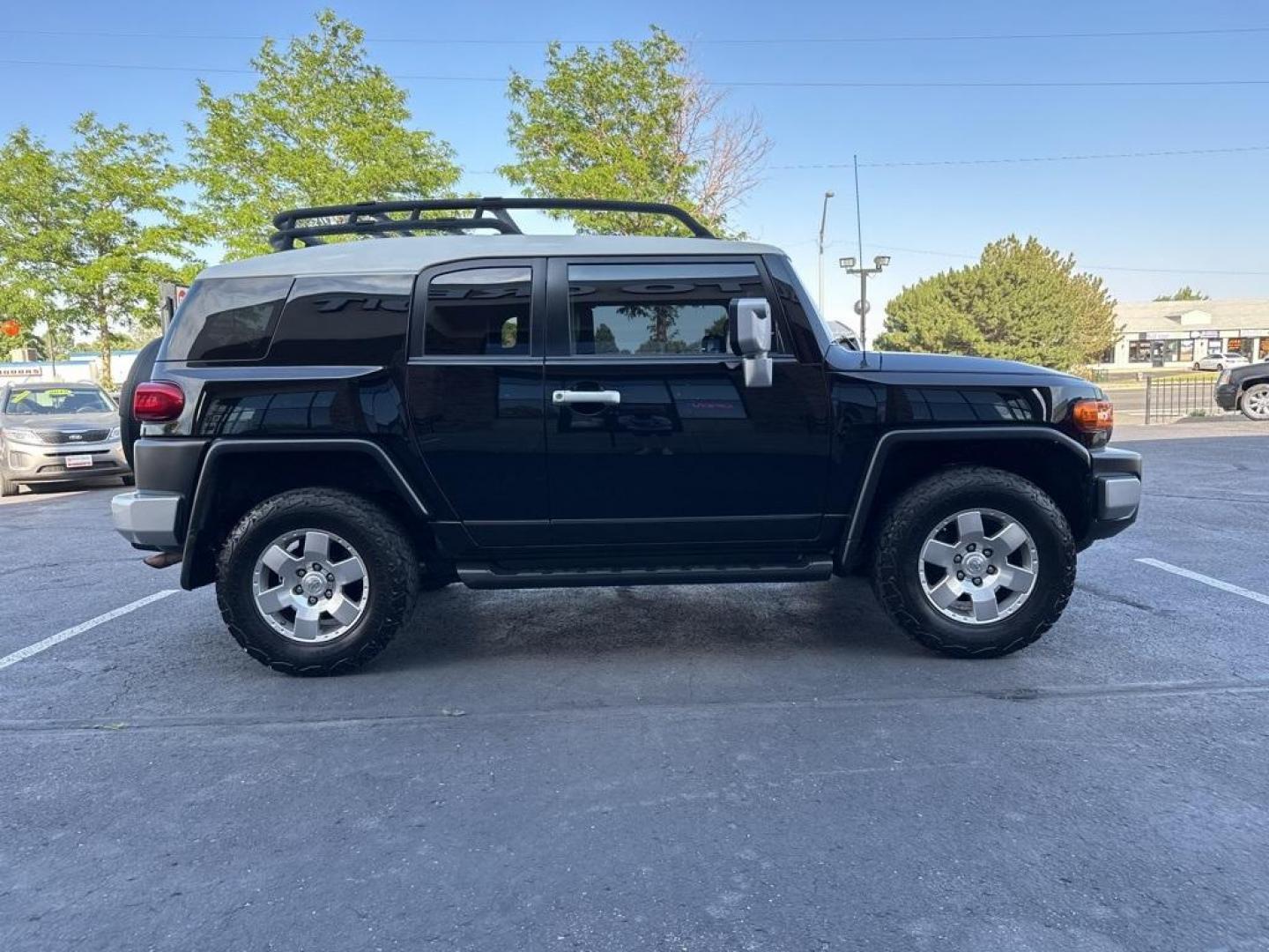 2010 Black /Dark Charcoal Toyota FJ Cruiser Upgade Package 2 (JTEBU4BF7AK) with an 4.0L V6 DOHC VVT-i 24V engine, Automatic transmission, located at 8595 Washington St., Thornton, CO, 80229, (303) 287-5511, 39.852348, -104.978447 - Toyota FJ Cruiser ONE OWNER in near mint condition with ZERO signs of abuse or off roading!! With upgade package 2 that includes, locking rear diff, 9 speaker audio and more. One owner and completley stock and never abused. Condition is everything and you wont find a cleaner one. Odometer is 87309 m - Photo#4