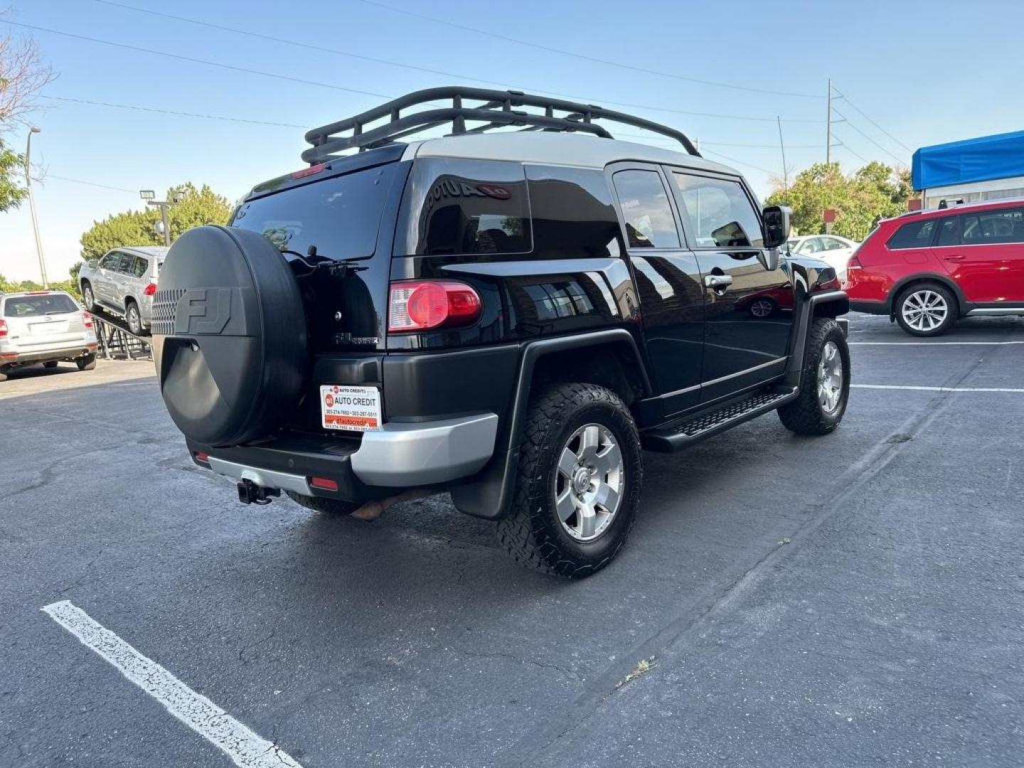 2010 Black /Dark Charcoal Toyota FJ Cruiser Upgade Package 2 (JTEBU4BF7AK) with an 4.0L V6 DOHC VVT-i 24V engine, Automatic transmission, located at 8595 Washington St., Thornton, CO, 80229, (303) 287-5511, 39.852348, -104.978447 - Toyota FJ Cruiser ONE OWNER in near mint condition with ZERO signs of abuse or off roading!! With upgade package 2 that includes, locking rear diff, 9 speaker audio and more. One owner and completley stock and never abused. Condition is everything and you wont find a cleaner one. Odometer is 87309 m - Photo#5