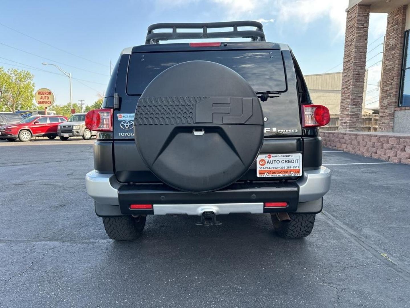 2010 Black /Dark Charcoal Toyota FJ Cruiser Upgade Package 2 (JTEBU4BF7AK) with an 4.0L V6 DOHC VVT-i 24V engine, Automatic transmission, located at 8595 Washington St., Thornton, CO, 80229, (303) 287-5511, 39.852348, -104.978447 - Toyota FJ Cruiser ONE OWNER in near mint condition with ZERO signs of abuse or off roading!! With upgade package 2 that includes, locking rear diff, 9 speaker audio and more. One owner and completley stock and never abused. Condition is everything and you wont find a cleaner one. Odometer is 87309 m - Photo#6