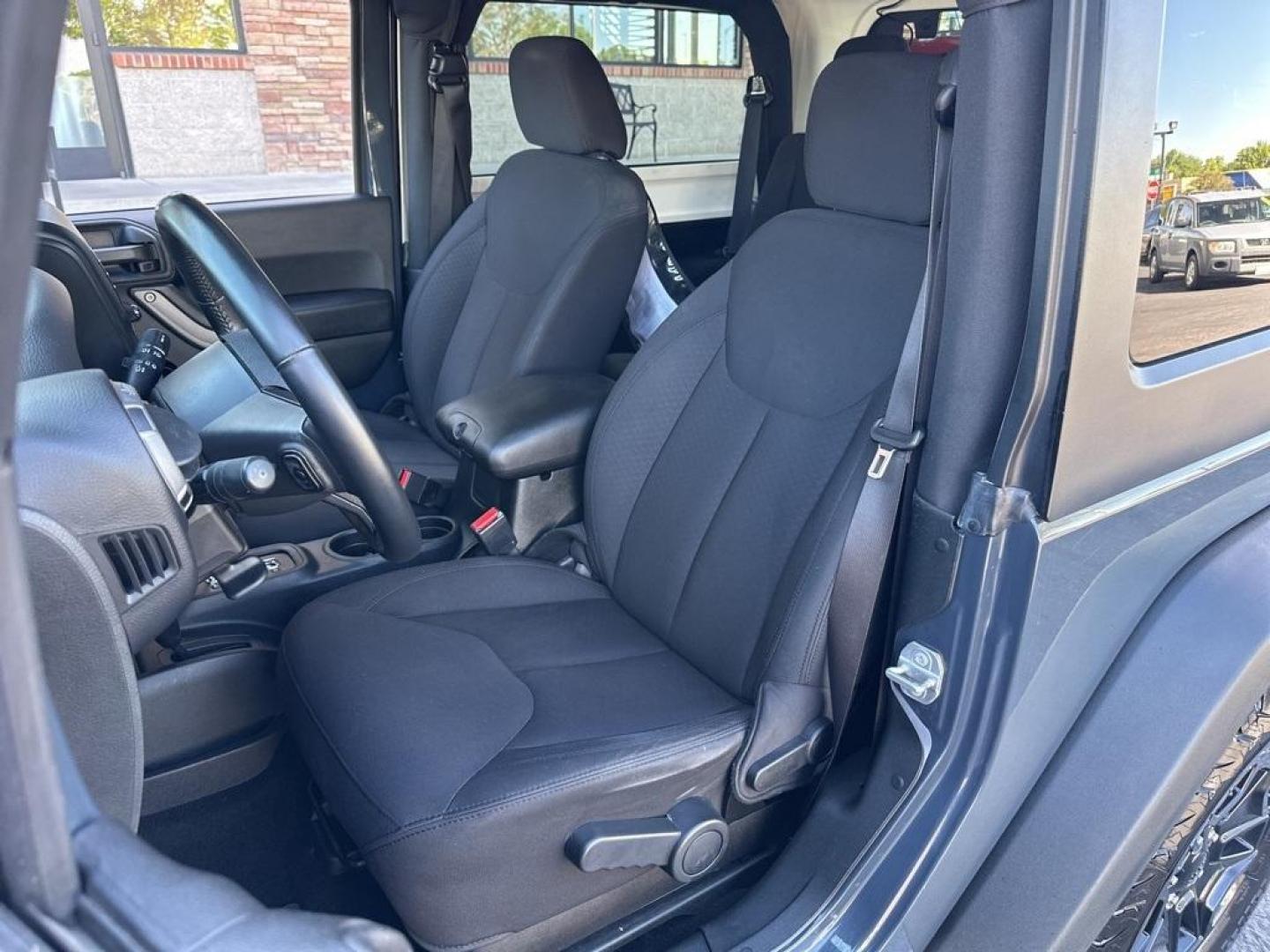 2017 Rhino Clearcoat /Black Jeep Wrangler Willys Wheeler (1C4GJWAG1HL) with an 3.6L V6 24V VVT engine, Automatic transmission, located at 8595 Washington St., Thornton, CO, 80229, (303) 287-5511, 39.852348, -104.978447 - 2017 Jeep Wrangler Willys with Wheeler Package in excellent condition with no signs of off road use. Loaded with power windows and locks, Bluetooth, Cruise Control, A/C and more. <br><br>All Cars Have Clean Titles And Are Serviced Before Sale., Clean Carfax, No Accident, New Tires, 4WD, Rhino Clear - Photo#12