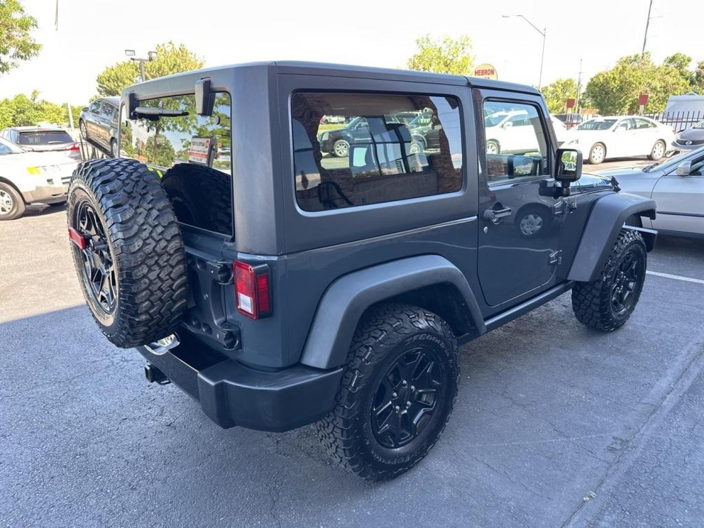 2017 Rhino Clearcoat /Black Jeep Wrangler Willys Wheeler (1C4GJWAG1HL) with an 3.6L V6 24V VVT engine, Automatic transmission, located at 8595 Washington St., Thornton, CO, 80229, (303) 287-5511, 39.852348, -104.978447 - 2017 Jeep Wrangler Willys with Wheeler Package in excellent condition with no signs of off road use. Loaded with power windows and locks, Bluetooth, Cruise Control, A/C and more. <br><br>All Cars Have Clean Titles And Are Serviced Before Sale., Clean Carfax, No Accident, New Tires, 4WD, Rhino Clear - Photo#5