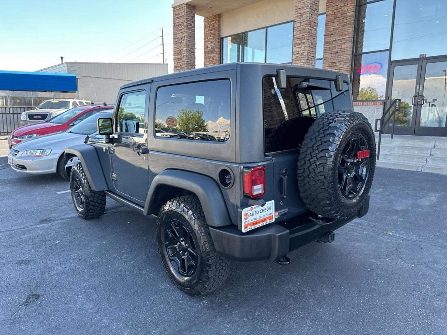 2017 Rhino Clearcoat /Black Jeep Wrangler Willys Wheeler (1C4GJWAG1HL) with an 3.6L V6 24V VVT engine, Automatic transmission, located at 8595 Washington St., Thornton, CO, 80229, (303) 287-5511, 39.852348, -104.978447 - 2017 Jeep Wrangler Willys with Wheeler Package in excellent condition with no signs of off road use. Loaded with power windows and locks, Bluetooth, Cruise Control, A/C and more. <br><br>All Cars Have Clean Titles And Are Serviced Before Sale., Clean Carfax, No Accident, New Tires, 4WD, Rhino Clear - Photo#7