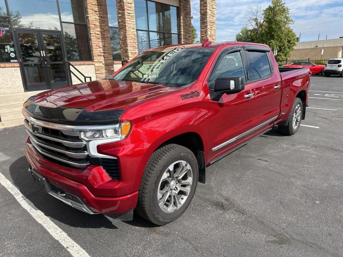 2023 Radiant Red Tintcoat /Jet Black Chevrolet Silverado 1500 High Country (3GCUDJE80PG) with an 3.0L I6 engine, Automatic transmission, located at 8595 Washington St., Thornton, CO, 80229, (303) 287-5511, 39.852348, -104.978447 - 2023 Chevrolet Silverado 1500 3.0 Diesel in like new condition. Fully loaded! <br>All Cars Have Clean Titles And Are Serviced Before Sale., CarfaxOne Owner, No Accidents, Apple/Android Car Play, All Books and Keys, Blind Spot Monitoring, Backup Camera, Leather, Collision Warning, Heated and Ventilat - Photo#1