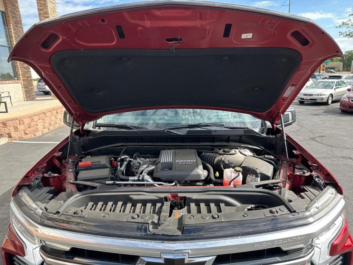 2023 Radiant Red Tintcoat /Jet Black Chevrolet Silverado 1500 High Country (3GCUDJE80PG) with an 3.0L I6 engine, Automatic transmission, located at 8595 Washington St., Thornton, CO, 80229, (303) 287-5511, 39.852348, -104.978447 - 2023 Chevrolet Silverado 1500 3.0 Diesel in like new condition. Fully loaded! <br>All Cars Have Clean Titles And Are Serviced Before Sale., CarfaxOne Owner, No Accidents, Apple/Android Car Play, All Books and Keys, Blind Spot Monitoring, Backup Camera, Leather, Collision Warning, Heated and Ventilat - Photo#32