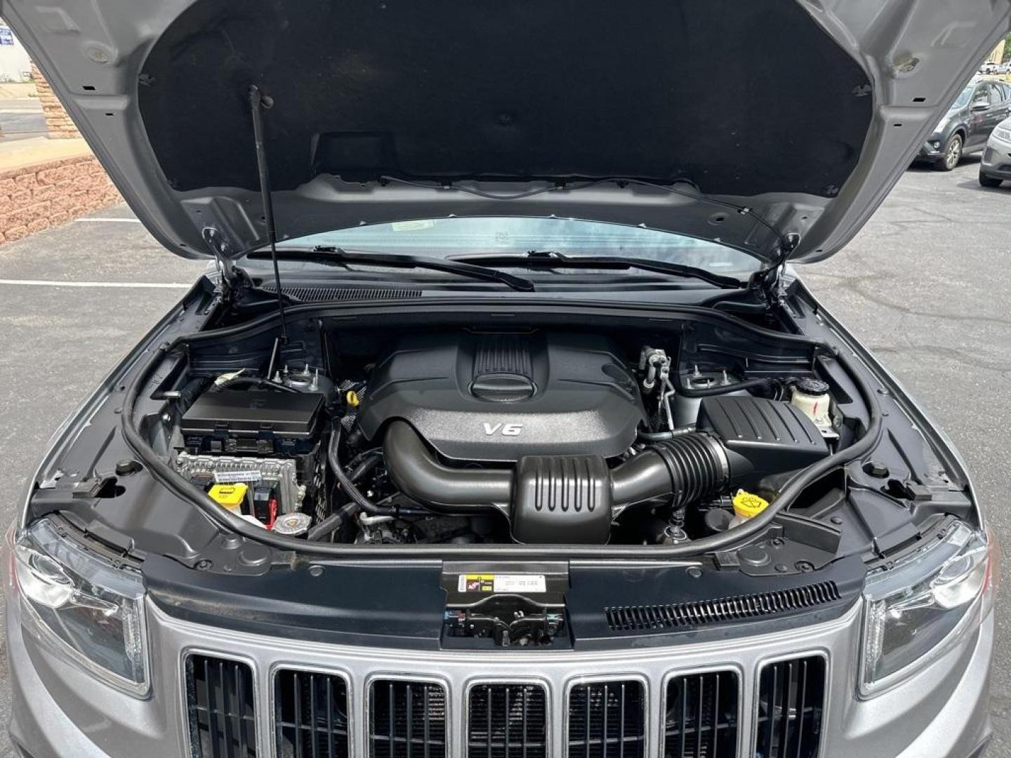 2014 Billet Silver Metallic Clearcoat /Black Jeep Grand Cherokee Limited (1C4RJFBG7EC) with an 3.6L V6 Flex Fuel 24V VVT engine, Automatic transmission, located at 8595 Washington St., Thornton, CO, 80229, (303) 287-5511, 39.852348, -104.978447 - 2014 Jeep Grand Cherokee, One Owner, Colorado car and a non smoker, non pet car. Limited, 4x4 with very low miles and in excellent condition. Fully serviced including new tires. <br>All Cars Have Clean Titles And Are Serviced Before Sale., All Books and Keys, New Tires, Backup Camera, Leather, Heate - Photo#36