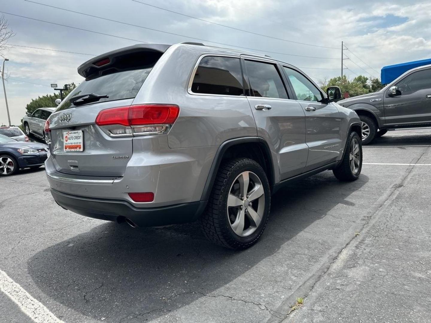 2014 Billet Silver Metallic Clearcoat /Black Jeep Grand Cherokee Limited (1C4RJFBG7EC) with an 3.6L V6 Flex Fuel 24V VVT engine, Automatic transmission, located at 8595 Washington St., Thornton, CO, 80229, (303) 287-5511, 39.852348, -104.978447 - 2014 Jeep Grand Cherokee, One Owner, Colorado car and a non smoker, non pet car. Limited, 4x4 with very low miles and in excellent condition. Fully serviced including new tires. <br>All Cars Have Clean Titles And Are Serviced Before Sale., All Books and Keys, New Tires, Backup Camera, Leather, Heate - Photo#5