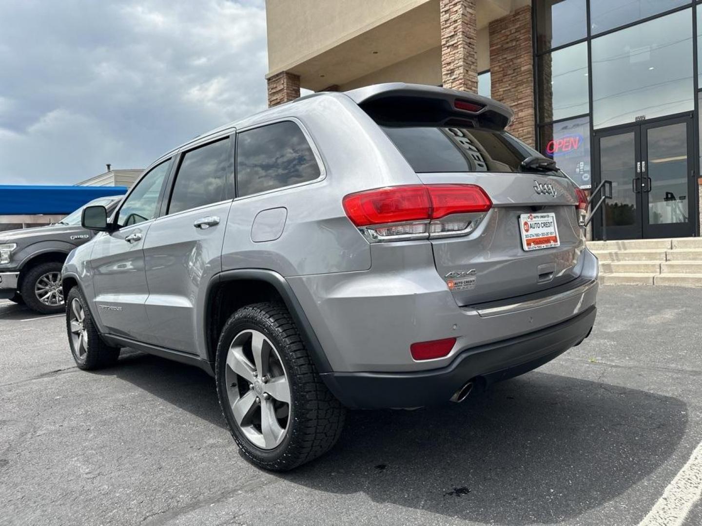 2014 Billet Silver Metallic Clearcoat /Black Jeep Grand Cherokee Limited (1C4RJFBG7EC) with an 3.6L V6 Flex Fuel 24V VVT engine, Automatic transmission, located at 8595 Washington St., Thornton, CO, 80229, (303) 287-5511, 39.852348, -104.978447 - 2014 Jeep Grand Cherokee, One Owner, Colorado car and a non smoker, non pet car. Limited, 4x4 with very low miles and in excellent condition. Fully serviced including new tires. <br>All Cars Have Clean Titles And Are Serviced Before Sale., All Books and Keys, New Tires, Backup Camera, Leather, Heate - Photo#7