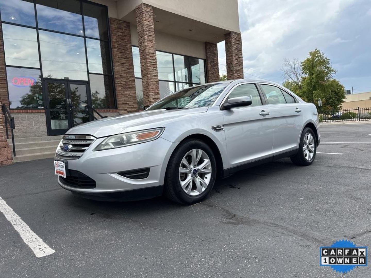 2011 Ingot Silver Metallic /Light Stone Ford Taurus SEL (1FAHP2EW4BG) with an Duratec 3.5L V6 engine, Automatic transmission, located at 8595 Washington St., Thornton, CO, 80229, (303) 287-5511, 39.852348, -104.978447 - 2011 Ford Taurus, One Owner, Clean Title and fully serviced in excellent condition inside and out! <br><br>All Cars Have Clean Titles And Are Serviced Before Sale., CarfaxOne Owner, No Accidents, All Books and Keys, New Tires, Backup Camera, Bluetooth/ With Bluetooth Audio, Power Seats, Non Smoker, - Photo#1