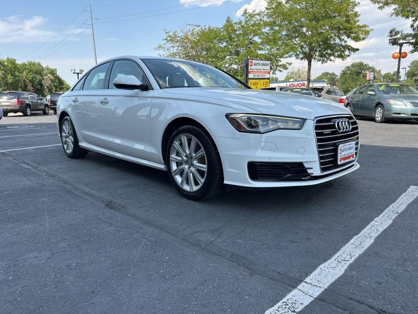 2016 Ibis White /Atlas Beige Audi A6 2.0T Premium Plus (WAUGFAFC4GN) with an 2.0L 4-Cylinder TFSI engine, Automatic transmission, located at 8595 Washington St., Thornton, CO, 80229, (303) 287-5511, 39.852348, -104.978447 - 2016 Audi A6 Premium Plus, Clean Title and fully serviced including new tires, brakes and more. This is a non smoker car and very clean. <br><br>All Cars Have Clean Titles And Are Serviced Before Sale., Clean Carfax, No Accident, Blind Spot Monitoring, Backup Camera, Heated Seats, Bluetooth/ With Bl - Photo#1