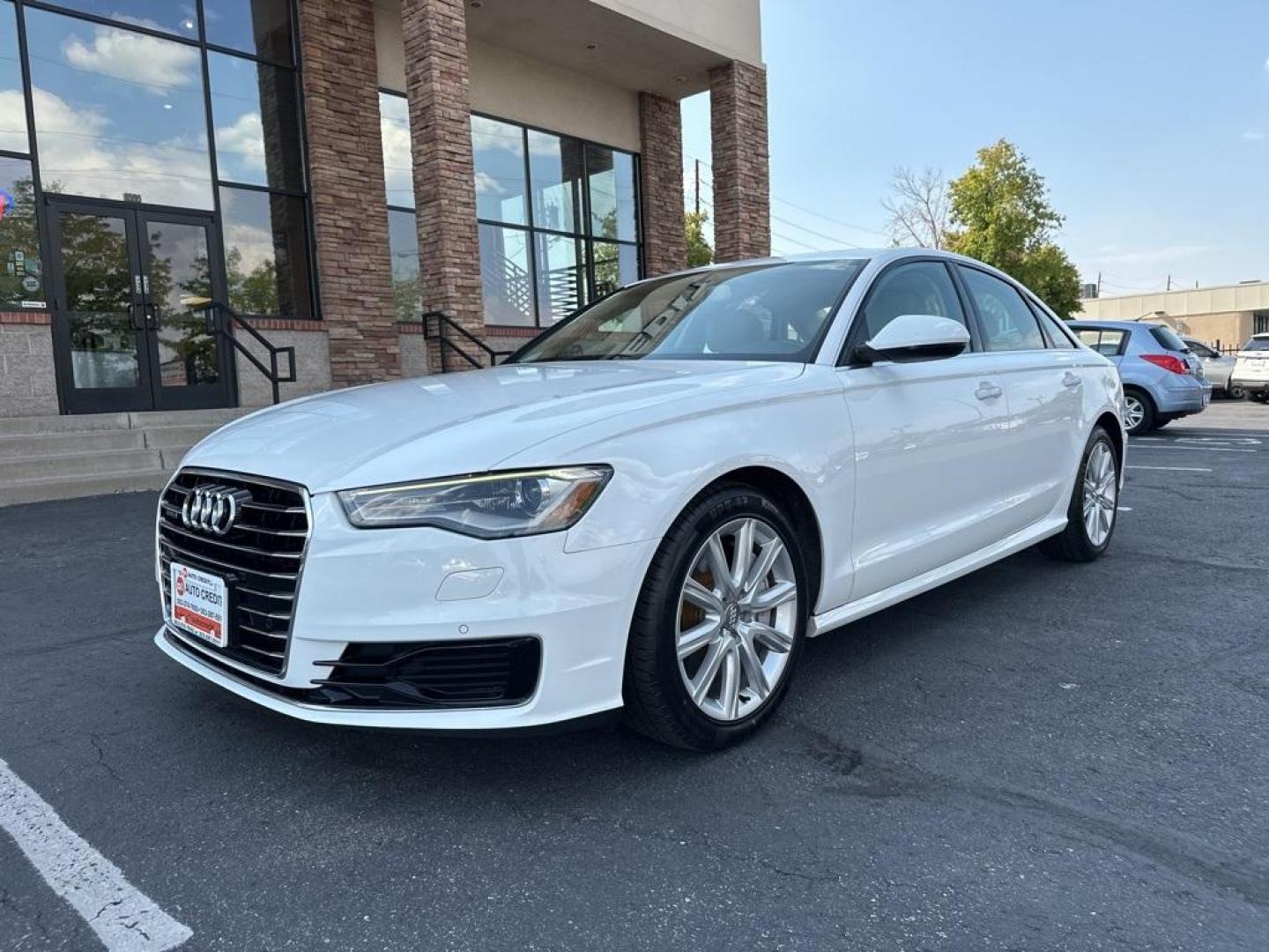 2016 Ibis White /Atlas Beige Audi A6 2.0T Premium Plus (WAUGFAFC4GN) with an 2.0L 4-Cylinder TFSI engine, Automatic transmission, located at 8595 Washington St., Thornton, CO, 80229, (303) 287-5511, 39.852348, -104.978447 - 2016 Audi A6 Premium Plus, Clean Title and fully serviced including new tires, brakes and more. This is a non smoker car and very clean. <br><br>All Cars Have Clean Titles And Are Serviced Before Sale., Clean Carfax, No Accident, Blind Spot Monitoring, Backup Camera, Heated Seats, Bluetooth/ With Bl - Photo#3