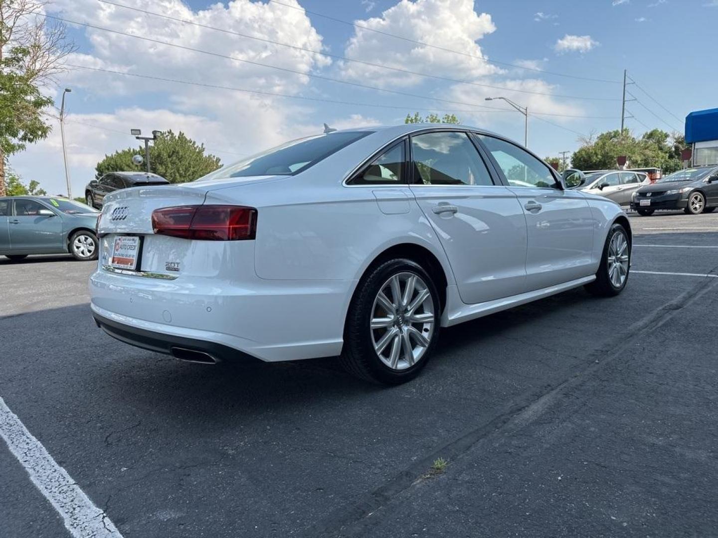 2016 Ibis White /Atlas Beige Audi A6 2.0T Premium Plus (WAUGFAFC4GN) with an 2.0L 4-Cylinder TFSI engine, Automatic transmission, located at 8595 Washington St., Thornton, CO, 80229, (303) 287-5511, 39.852348, -104.978447 - 2016 Audi A6 Premium Plus, Clean Title and fully serviced including new tires, brakes and more. This is a non smoker car and very clean. <br><br>All Cars Have Clean Titles And Are Serviced Before Sale., Clean Carfax, No Accident, Blind Spot Monitoring, Backup Camera, Heated Seats, Bluetooth/ With Bl - Photo#5