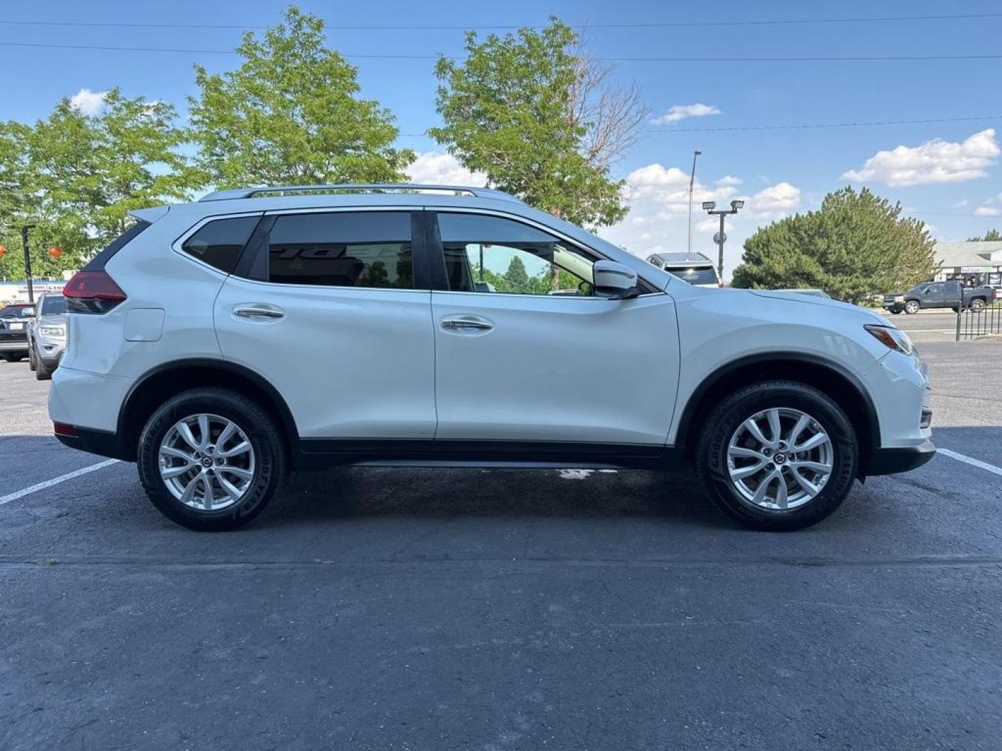 2018 Pearl White /Charcoal Nissan Rogue SV (KNMAT2MVXJP) with an 2.5L I4 DOHC 16V engine, CVT transmission, located at 8595 Washington St., Thornton, CO, 80229, (303) 287-5511, 39.852348, -104.978447 - 2018 Nissan Rogue All Wheel Drive, ONE OWNER with no accidents. Very clean inside and out, Non smoker, Non pet car. <br><br>All Cars Have Clean Titles And Are Serviced Before Sale., CarfaxOne Owner, No Accidents, Apple/Android Car Play, All Books and Keys, Backup Camera, Bluetooth/ With Bluetooth Au - Photo#4