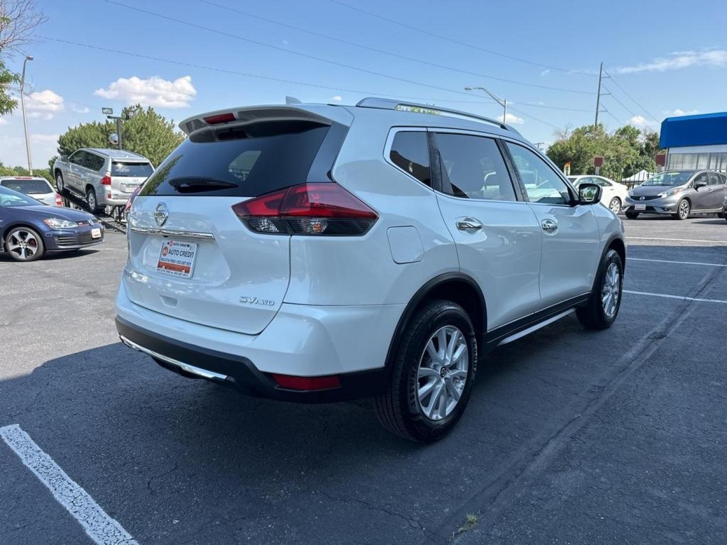 2018 Pearl White /Charcoal Nissan Rogue SV (KNMAT2MVXJP) with an 2.5L I4 DOHC 16V engine, CVT transmission, located at 8595 Washington St., Thornton, CO, 80229, (303) 287-5511, 39.852348, -104.978447 - 2018 Nissan Rogue All Wheel Drive, ONE OWNER with no accidents. Very clean inside and out, Non smoker, Non pet car. <br><br>All Cars Have Clean Titles And Are Serviced Before Sale., CarfaxOne Owner, No Accidents, Apple/Android Car Play, All Books and Keys, Backup Camera, Bluetooth/ With Bluetooth Au - Photo#5