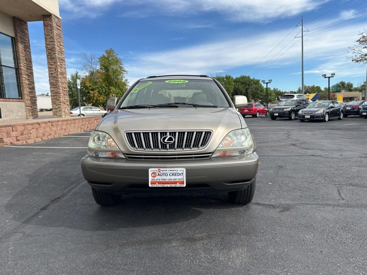 2002 Burnished Gold Metallic /Ivory Lexus RX 300 (JTJGF10U820) with an 3.0L V6 SMPI DOHC engine, Automatic transmission, located at 8595 Washington St., Thornton, CO, 80229, (303) 287-5511, 39.852348, -104.978447 - 2002 Lexus RX<br><br>D1 Auto NEVER charges dealer fees! All cars have clean titles and have been inspected for mechanical issues. We have financing for everyone. Good credit, bad credit, first time buyers.<br>Clean CARFAX.<br>Please call Lakewood Location 303-274-7692 or Thornton 303-287-5511 to sch - Photo#2