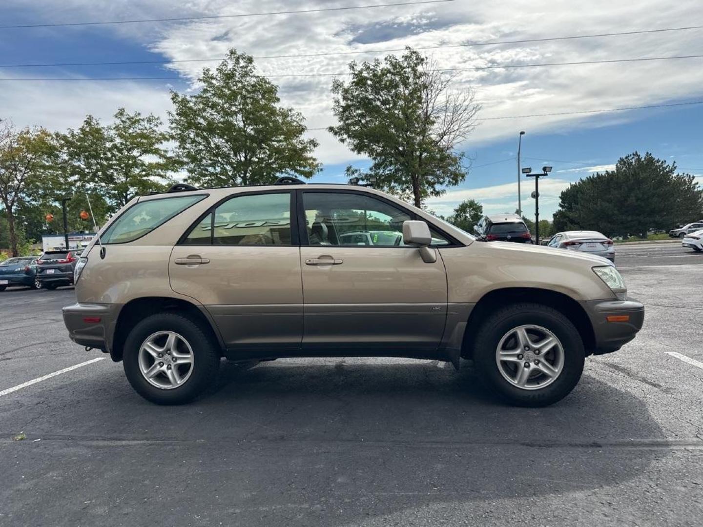 2002 Burnished Gold Metallic /Ivory Lexus RX 300 (JTJGF10U820) with an 3.0L V6 SMPI DOHC engine, Automatic transmission, located at 8595 Washington St., Thornton, CO, 80229, (303) 287-5511, 39.852348, -104.978447 - 2002 Lexus RX<br><br>D1 Auto NEVER charges dealer fees! All cars have clean titles and have been inspected for mechanical issues. We have financing for everyone. Good credit, bad credit, first time buyers.<br>Clean CARFAX.<br>Please call Lakewood Location 303-274-7692 or Thornton 303-287-5511 to sch - Photo#4