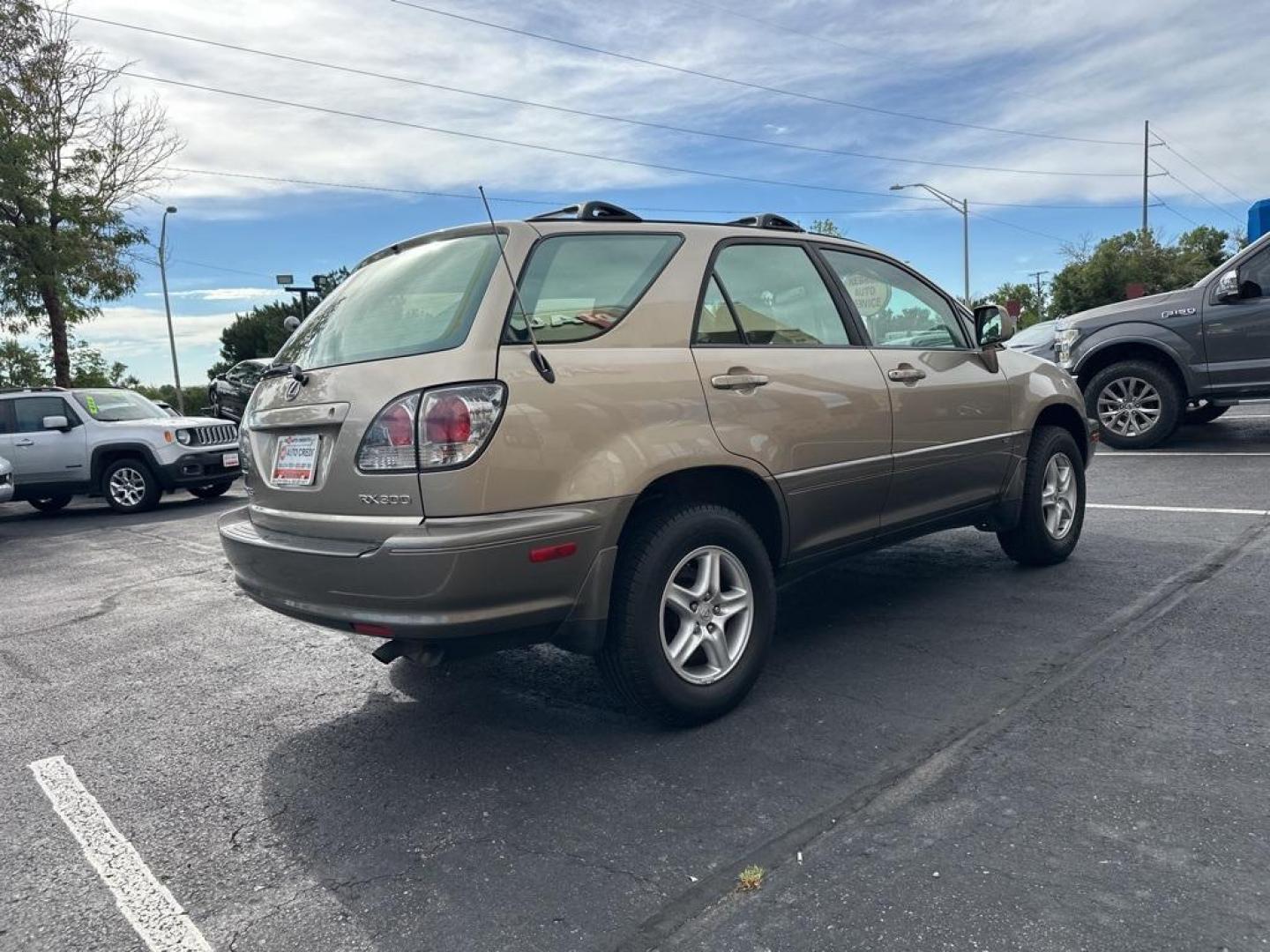 2002 Burnished Gold Metallic /Ivory Lexus RX 300 (JTJGF10U820) with an 3.0L V6 SMPI DOHC engine, Automatic transmission, located at 8595 Washington St., Thornton, CO, 80229, (303) 287-5511, 39.852348, -104.978447 - 2002 Lexus RX<br><br>D1 Auto NEVER charges dealer fees! All cars have clean titles and have been inspected for mechanical issues. We have financing for everyone. Good credit, bad credit, first time buyers.<br>Clean CARFAX.<br>Please call Lakewood Location 303-274-7692 or Thornton 303-287-5511 to sch - Photo#5