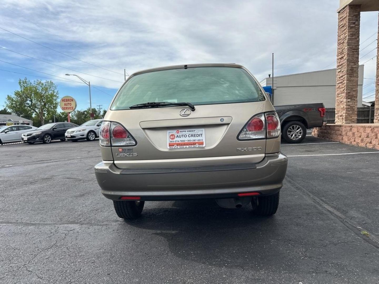 2002 Burnished Gold Metallic /Ivory Lexus RX 300 (JTJGF10U820) with an 3.0L V6 SMPI DOHC engine, Automatic transmission, located at 8595 Washington St., Thornton, CO, 80229, (303) 287-5511, 39.852348, -104.978447 - 2002 Lexus RX<br><br>D1 Auto NEVER charges dealer fees! All cars have clean titles and have been inspected for mechanical issues. We have financing for everyone. Good credit, bad credit, first time buyers.<br>Clean CARFAX.<br>Please call Lakewood Location 303-274-7692 or Thornton 303-287-5511 to sch - Photo#6