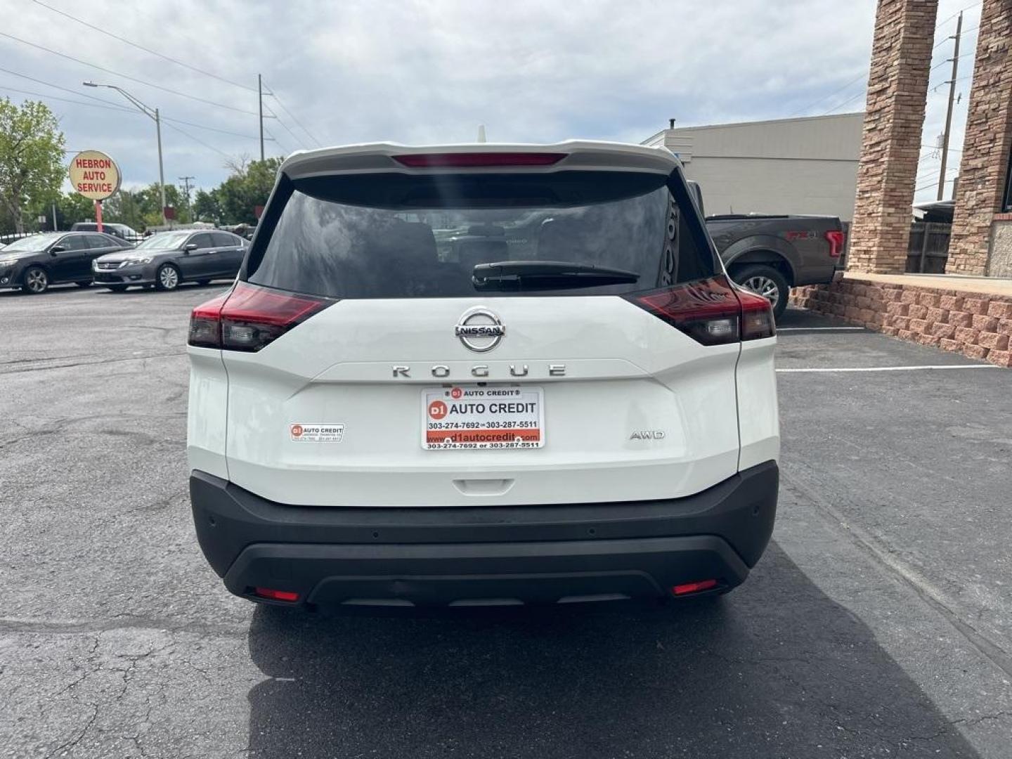 2021 Glacier White /Charcoal Nissan Rogue S (5N1AT3AB0MC) with an 2.5L I4 DOHC 16V engine, CVT transmission, located at 8595 Washington St., Thornton, CO, 80229, (303) 287-5511, 39.852348, -104.978447 - 2021 Nissan Rogue One Owner, This car still smells new and has 2 keys and owners manuals. You wont find one in better condition. All Wheel Drive, backup camera with backup sensors, Apple/Android CarPlay ,New Tires and ready for Colorado! Excellent condition inside and out. <br><br>All Cars Have Clea - Photo#6