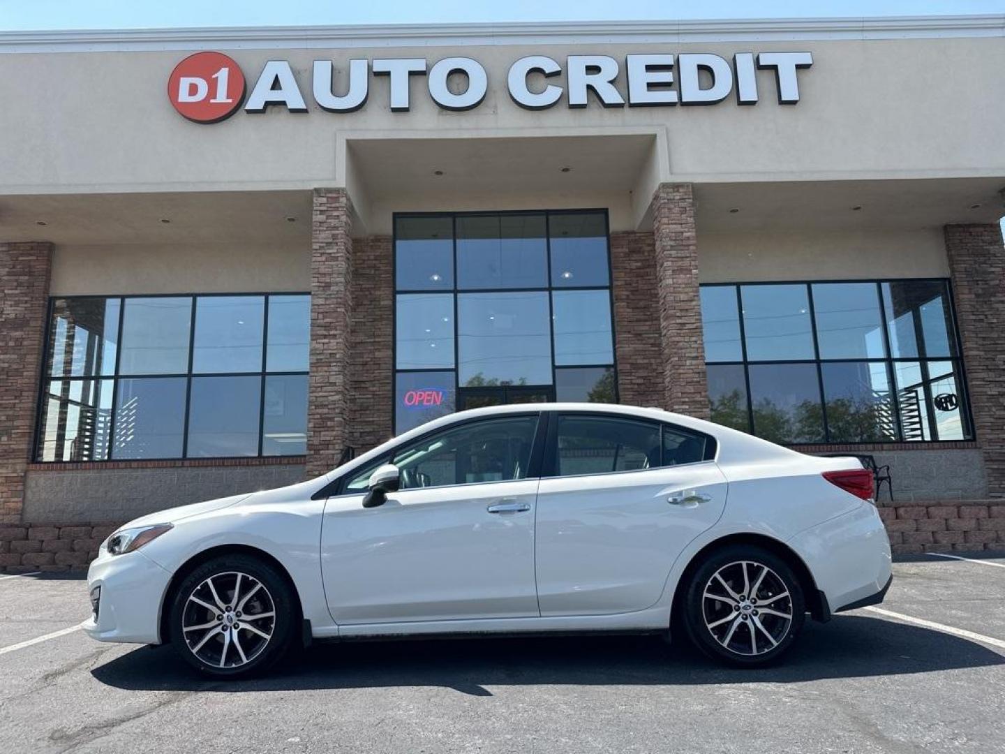 2017 Crystal White Pearl /Black Subaru Impreza 2.0i Limited (4S3GKAN67H3) with an 2.0L 4-Cylinder DOHC 16V engine, CVT transmission, located at 8595 Washington St., Thornton, CO, 80229, (303) 287-5511, 39.852348, -104.978447 - 2017 Subaru Impreza In mint condition and still smells and looks new inside and out. You will not find a cleaner one anywhere. All keys, owners manuals and 2 sets of floor mats. Loaded with heated leather seats, Apple/Android Carplay, backup camera and more. <br><br>All Cars Have Clean Titles And Ar - Photo#0