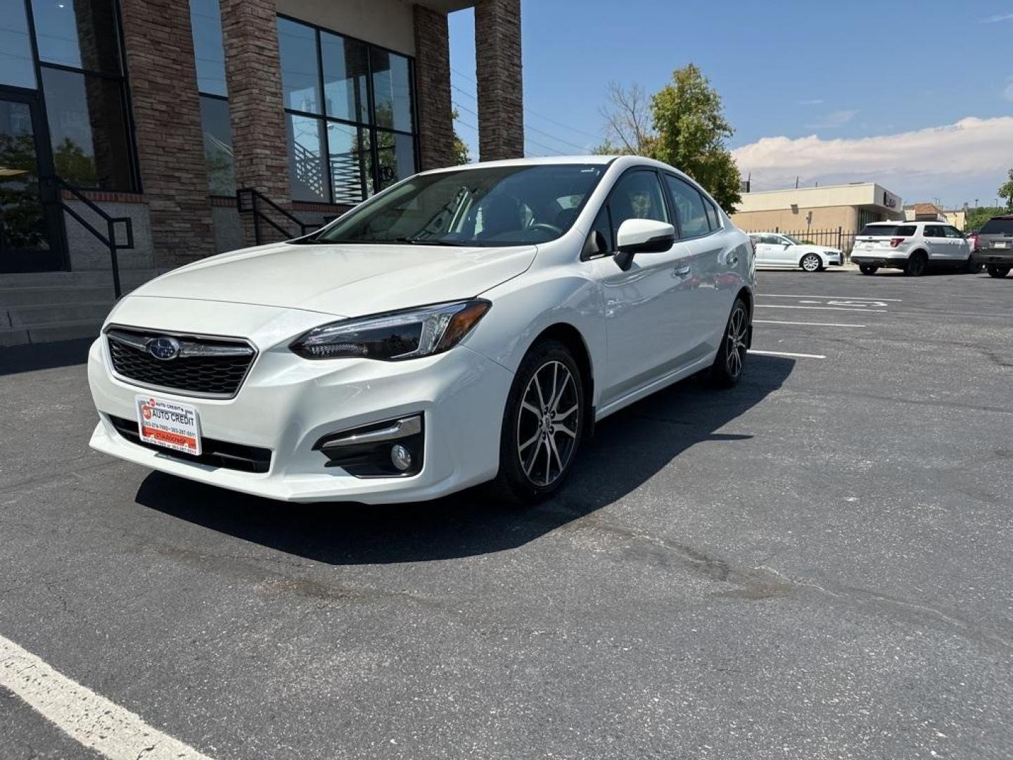 2017 Crystal White Pearl /Black Subaru Impreza 2.0i Limited (4S3GKAN67H3) with an 2.0L 4-Cylinder DOHC 16V engine, CVT transmission, located at 8595 Washington St., Thornton, CO, 80229, (303) 287-5511, 39.852348, -104.978447 - 2017 Subaru Impreza In mint condition and still smells and looks new inside and out. You will not find a cleaner one anywhere. All keys, owners manuals and 2 sets of floor mats. Loaded with heated leather seats, Apple/Android Carplay, backup camera and more. <br><br>All Cars Have Clean Titles And Ar - Photo#1