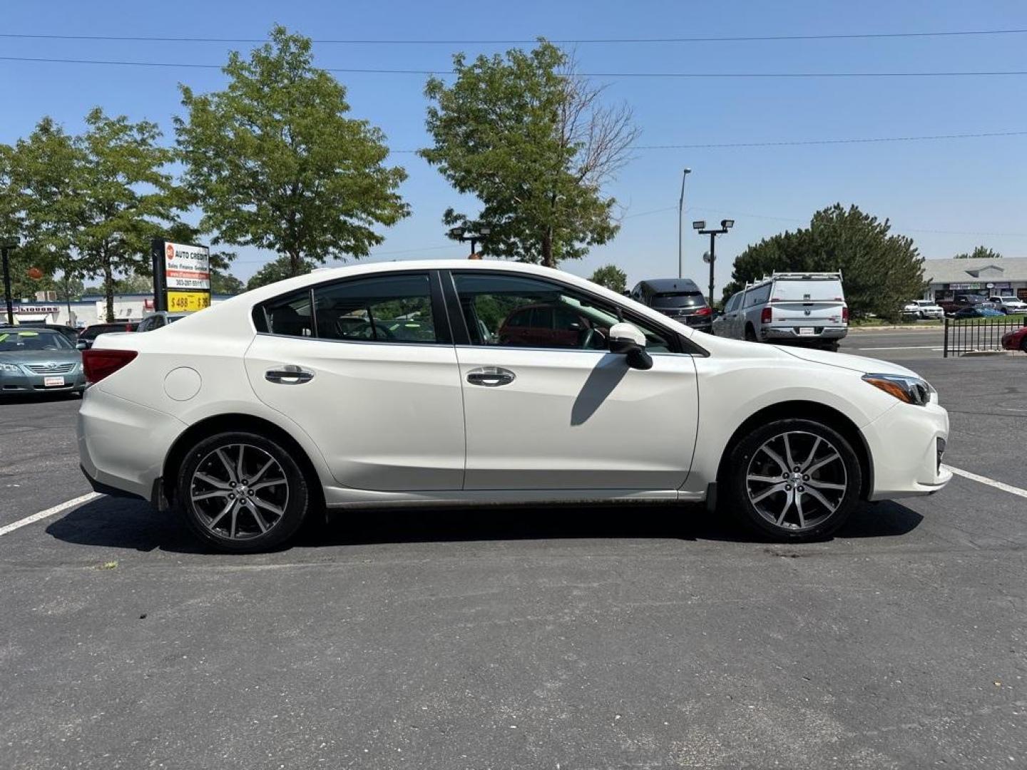 2017 Crystal White Pearl /Black Subaru Impreza 2.0i Limited (4S3GKAN67H3) with an 2.0L 4-Cylinder DOHC 16V engine, CVT transmission, located at 8595 Washington St., Thornton, CO, 80229, (303) 287-5511, 39.852348, -104.978447 - 2017 Subaru Impreza In mint condition and still smells and looks new inside and out. You will not find a cleaner one anywhere. All keys, owners manuals and 2 sets of floor mats. Loaded with heated leather seats, Apple/Android Carplay, backup camera and more. <br><br>All Cars Have Clean Titles And Ar - Photo#4