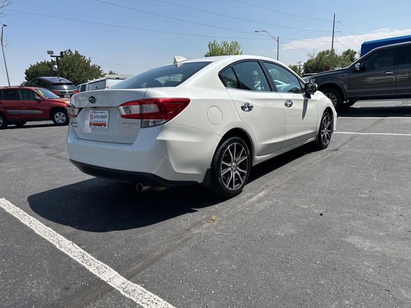 2017 Crystal White Pearl /Black Subaru Impreza 2.0i Limited (4S3GKAN67H3) with an 2.0L 4-Cylinder DOHC 16V engine, CVT transmission, located at 8595 Washington St., Thornton, CO, 80229, (303) 287-5511, 39.852348, -104.978447 - 2017 Subaru Impreza In mint condition and still smells and looks new inside and out. You will not find a cleaner one anywhere. All keys, owners manuals and 2 sets of floor mats. Loaded with heated leather seats, Apple/Android Carplay, backup camera and more. <br><br>All Cars Have Clean Titles And Ar - Photo#5