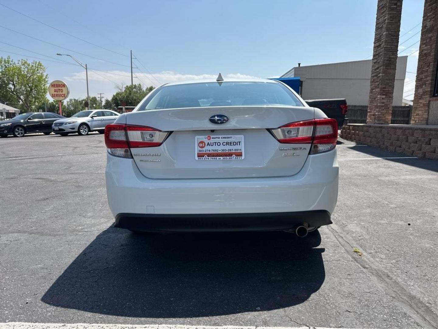 2017 Crystal White Pearl /Black Subaru Impreza 2.0i Limited (4S3GKAN67H3) with an 2.0L 4-Cylinder DOHC 16V engine, CVT transmission, located at 8595 Washington St., Thornton, CO, 80229, (303) 287-5511, 39.852348, -104.978447 - 2017 Subaru Impreza In mint condition and still smells and looks new inside and out. You will not find a cleaner one anywhere. All keys, owners manuals and 2 sets of floor mats. Loaded with heated leather seats, Apple/Android Carplay, backup camera and more. <br><br>All Cars Have Clean Titles And Ar - Photo#6