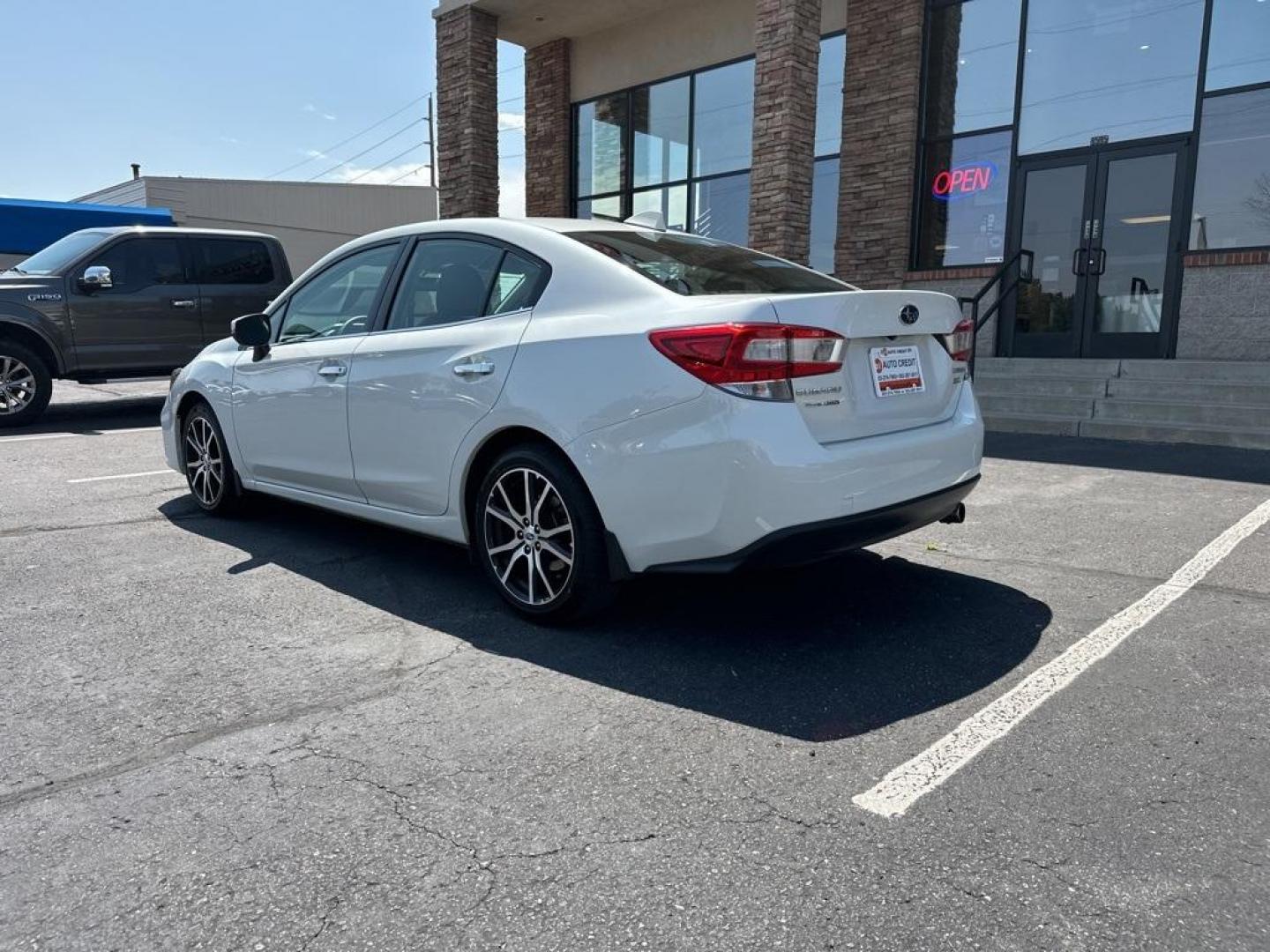 2017 Crystal White Pearl /Black Subaru Impreza 2.0i Limited (4S3GKAN67H3) with an 2.0L 4-Cylinder DOHC 16V engine, CVT transmission, located at 8595 Washington St., Thornton, CO, 80229, (303) 287-5511, 39.852348, -104.978447 - 2017 Subaru Impreza In mint condition and still smells and looks new inside and out. You will not find a cleaner one anywhere. All keys, owners manuals and 2 sets of floor mats. Loaded with heated leather seats, Apple/Android Carplay, backup camera and more. <br><br>All Cars Have Clean Titles And Ar - Photo#7