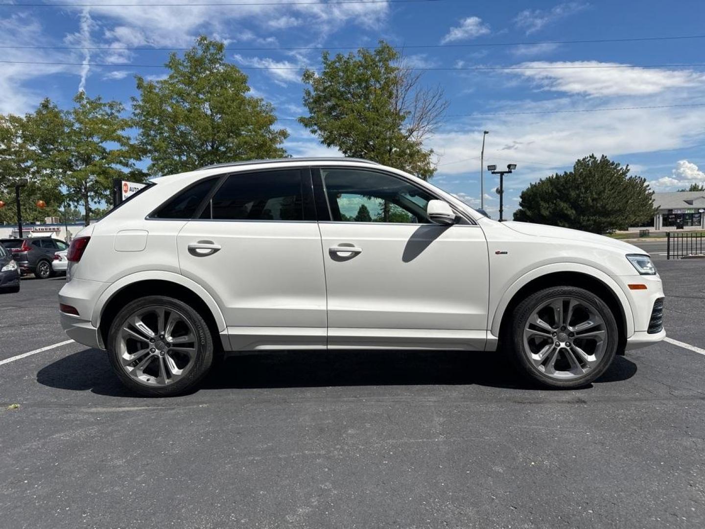 2018 Cortina White /Black Audi Q3 2.0T Premium Plus (WA1JCCFSXJR) with an 2.0L 4-Cylinder TFSI engine, Automatic transmission, located at 8595 Washington St., Thornton, CO, 80229, (303) 287-5511, 39.852348, -104.978447 - 2018 Audi Q3 Premium Plus, All Wheel Drive. This one is fully serviced including new tires. Veryclean inside and out showing pride of ownership. <br>All Cars Have Clean Titles And Are Serviced Before Sale., Clean Carfax, No Accident, Apple/Android Car Play, New Tires, Blind Spot Monitoring, Backup C - Photo#4