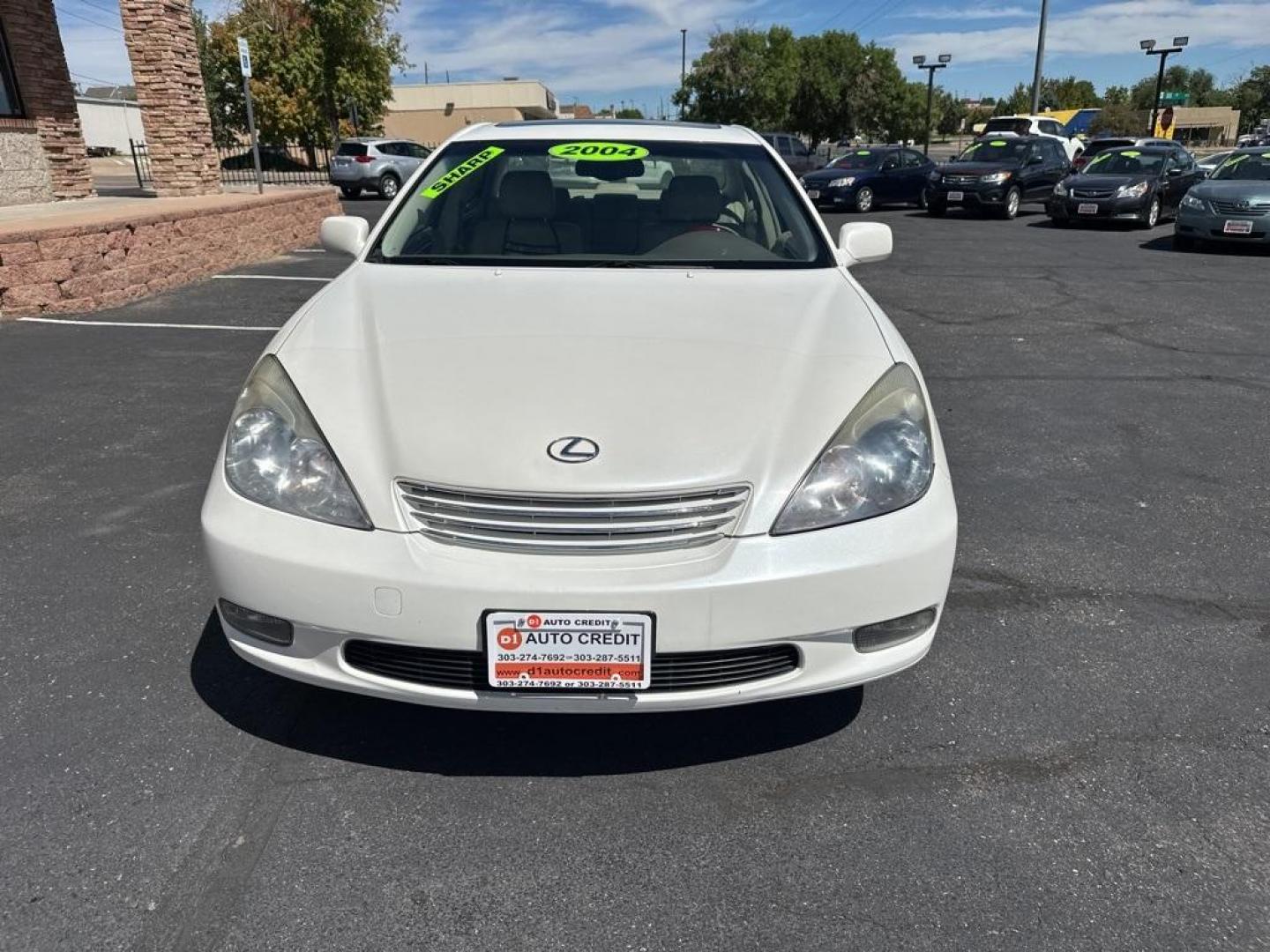 2004 White Lexus ES 330 (JTHBA30G245) with an 3.3L V6 SMPI DOHC engine, Automatic transmission, located at 8595 Washington St., Thornton, CO, 80229, (303) 287-5511, 39.852348, -104.978447 - 2004 Lexus ES<br><br>D1 Auto NEVER charges dealer fees! All cars have clean titles and have been inspected for mechanical issues. We have financing for everyone. Good credit, bad credit, first time buyers.<br>CARFAX One-Owner.<br>Please call Lakewood Location 303-274-7692 or Thornton 303-287-5511 to - Photo#0