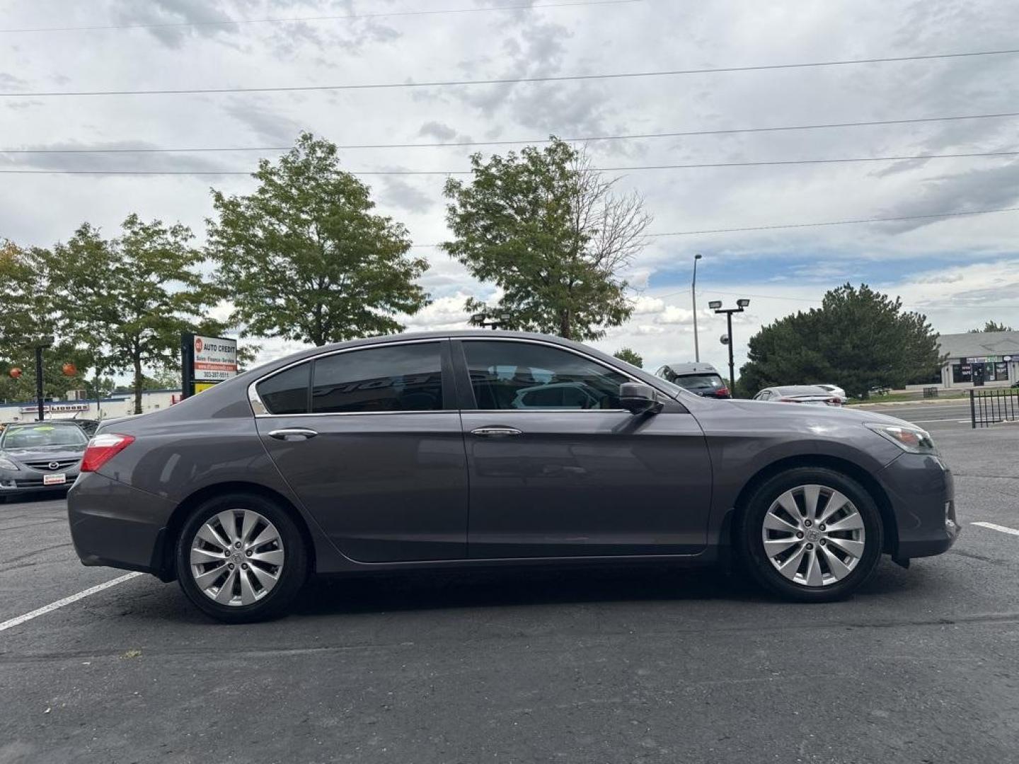 2015 Modern Steel Metallic /Gray Honda Accord EX-L (1HGCR2F80FA) with an 2.4L I4 DOHC i-VTEC 16V engine, CVT transmission, located at 8595 Washington St., Thornton, CO, 80229, (303) 287-5511, 39.852348, -104.978447 - 2015 Honda Accord in excellent condition inside and out. Clean title and really shows pride of ownership. Non smoker and loaded with, heaed leather seats, Bluetooth with Bluetooh audio to play your music, sun roof, 2 sets of floor mats, and fully serviced. <br>All Cars Have Clean Titles And Are Serv - Photo#4