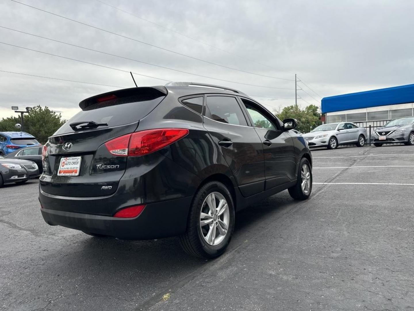 2013 Ash Black /Black Hyundai Tucson GLS (KM8JUCAC6DU) with an 2.4L I4 MPI DOHC CVVT 16V Theta 2 engine, Automatic transmission, located at 8595 Washington St., Thornton, CO, 80229, (303) 287-5511, 39.852348, -104.978447 - 2013 Hyundai Tucson<br><br>D1 Auto NEVER charges dealer fees! All cars have clean titles and have been inspected for mechanical issues. We have financing for everyone. Good credit, bad credit, first time buyers.<br><br>Please call Lakewood Location 303-274-7692 or Thornton 303-287-5511 to schedule a - Photo#5