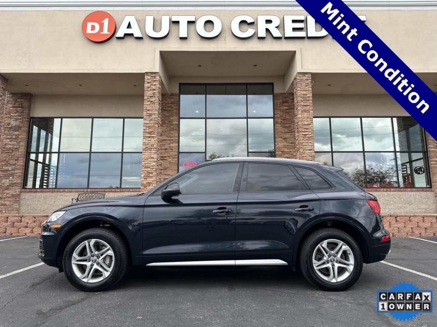 2018 Moonlight Blue Metallic /Rock Gray Audi Q5 2.0T Premium (WA1ANAFY8J2) with an 2.0L TFSI engine, Automatic transmission, located at 8595 Washington St., Thornton, CO, 80229, (303) 287-5511, 39.852348, -104.978447 - 2018 Audi Q5 One owner and not a scratch on this Audi!! Rare Moonlight Blue Metallic, this non smoker, non pet car is as clean as the day it rolled out of the factory. Truly a 10 out of 10 inside and out. New Michelin tires and fully serviced, ready for Colorado.<br><br>All Cars Have Clean Titles An - Photo#0