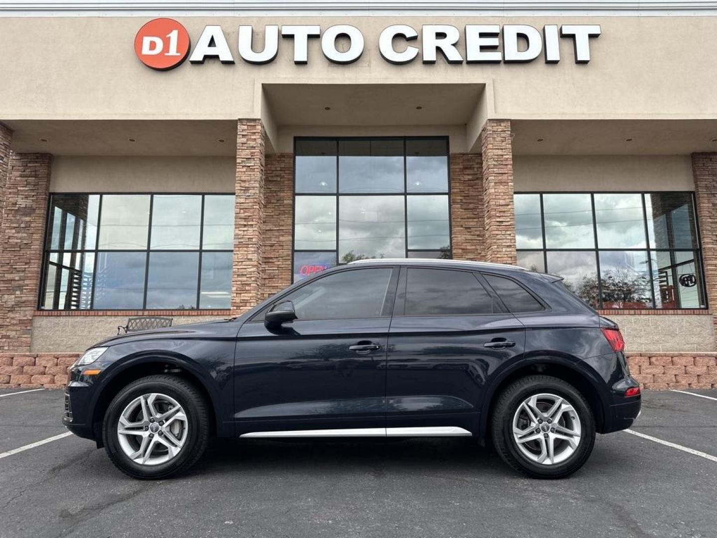 2018 Moonlight Blue Metallic /Black Audi Q5 2.0T Premium (WA1ANAFY8J2) with an 2.0L TFSI engine, Automatic transmission, located at 8595 Washington St., Thornton, CO, 80229, (303) 287-5511, 39.852348, -104.978447 - 2018 Audi Q5 One owner and not a scratch on this Audi!! Rare Moonlight Blue Metallic, this non smoker, non pet car is as clean as the day it rolled out of the factory. Truly a 10 out of 10 inside and out. New Michelin tires and fully serviced, ready for Colorado.<br><br>All Cars Have Clean Titles An - Photo#0