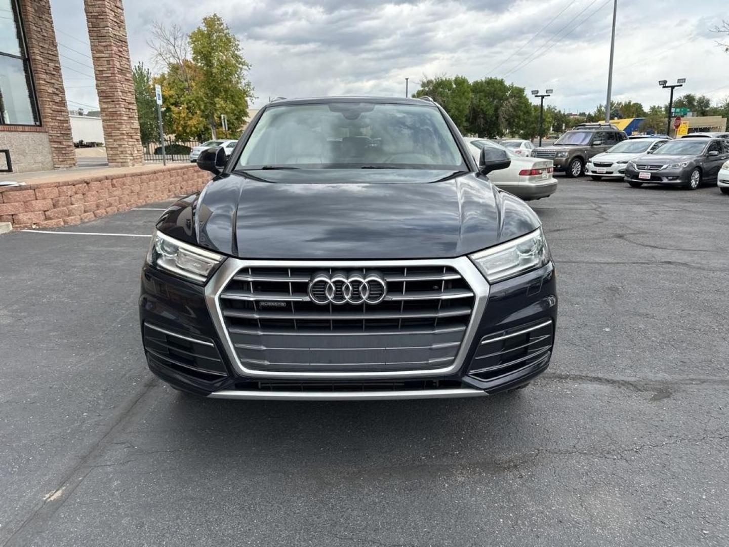 2018 Moonlight Blue Metallic /Black Audi Q5 2.0T Premium (WA1ANAFY8J2) with an 2.0L TFSI engine, Automatic transmission, located at 8595 Washington St., Thornton, CO, 80229, (303) 287-5511, 39.852348, -104.978447 - 2018 Audi Q5 One owner and not a scratch on this Audi!! Rare Moonlight Blue Metallic, this non smoker, non pet car is as clean as the day it rolled out of the factory. Truly a 10 out of 10 inside and out. New Michelin tires and fully serviced, ready for Colorado.<br><br>All Cars Have Clean Titles An - Photo#2