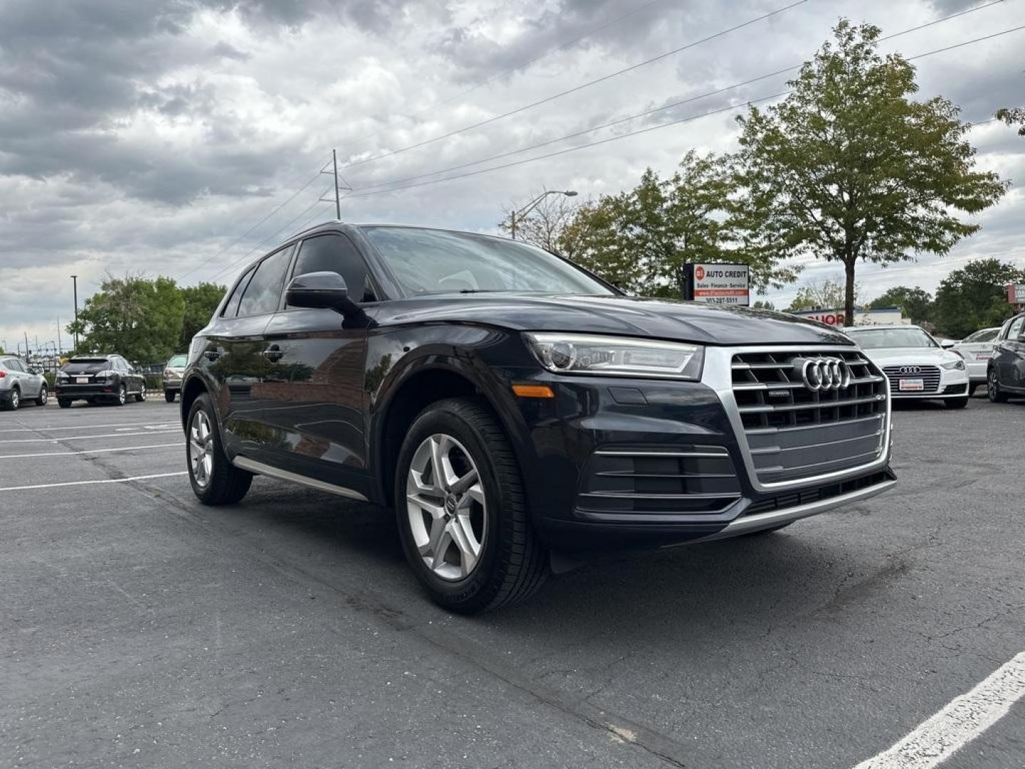 2018 Moonlight Blue Metallic /Black Audi Q5 2.0T Premium (WA1ANAFY8J2) with an 2.0L TFSI engine, Automatic transmission, located at 8595 Washington St., Thornton, CO, 80229, (303) 287-5511, 39.852348, -104.978447 - 2018 Audi Q5 One owner and not a scratch on this Audi!! Rare Moonlight Blue Metallic, this non smoker, non pet car is as clean as the day it rolled out of the factory. Truly a 10 out of 10 inside and out. New Michelin tires and fully serviced, ready for Colorado.<br><br>All Cars Have Clean Titles An - Photo#3