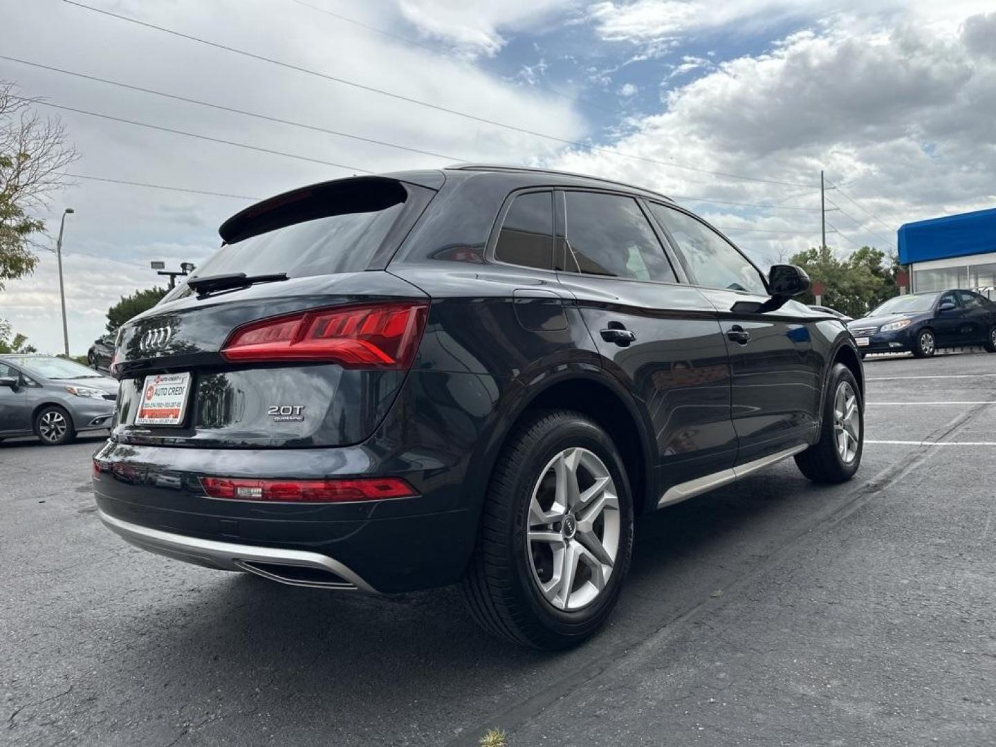 2018 Moonlight Blue Metallic /Black Audi Q5 2.0T Premium (WA1ANAFY8J2) with an 2.0L TFSI engine, Automatic transmission, located at 8595 Washington St., Thornton, CO, 80229, (303) 287-5511, 39.852348, -104.978447 - 2018 Audi Q5 One owner and not a scratch on this Audi!! Rare Moonlight Blue Metallic, this non smoker, non pet car is as clean as the day it rolled out of the factory. Truly a 10 out of 10 inside and out. New Michelin tires and fully serviced, ready for Colorado.<br><br>All Cars Have Clean Titles An - Photo#5