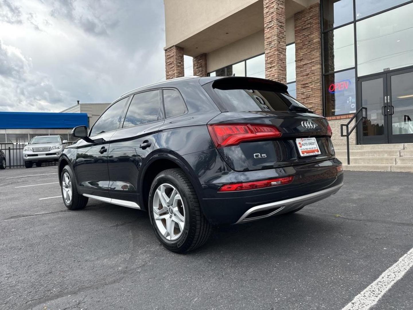 2018 Moonlight Blue Metallic /Black Audi Q5 2.0T Premium (WA1ANAFY8J2) with an 2.0L TFSI engine, Automatic transmission, located at 8595 Washington St., Thornton, CO, 80229, (303) 287-5511, 39.852348, -104.978447 - 2018 Audi Q5 One owner and not a scratch on this Audi!! Rare Moonlight Blue Metallic, this non smoker, non pet car is as clean as the day it rolled out of the factory. Truly a 10 out of 10 inside and out. New Michelin tires and fully serviced, ready for Colorado.<br><br>All Cars Have Clean Titles An - Photo#8