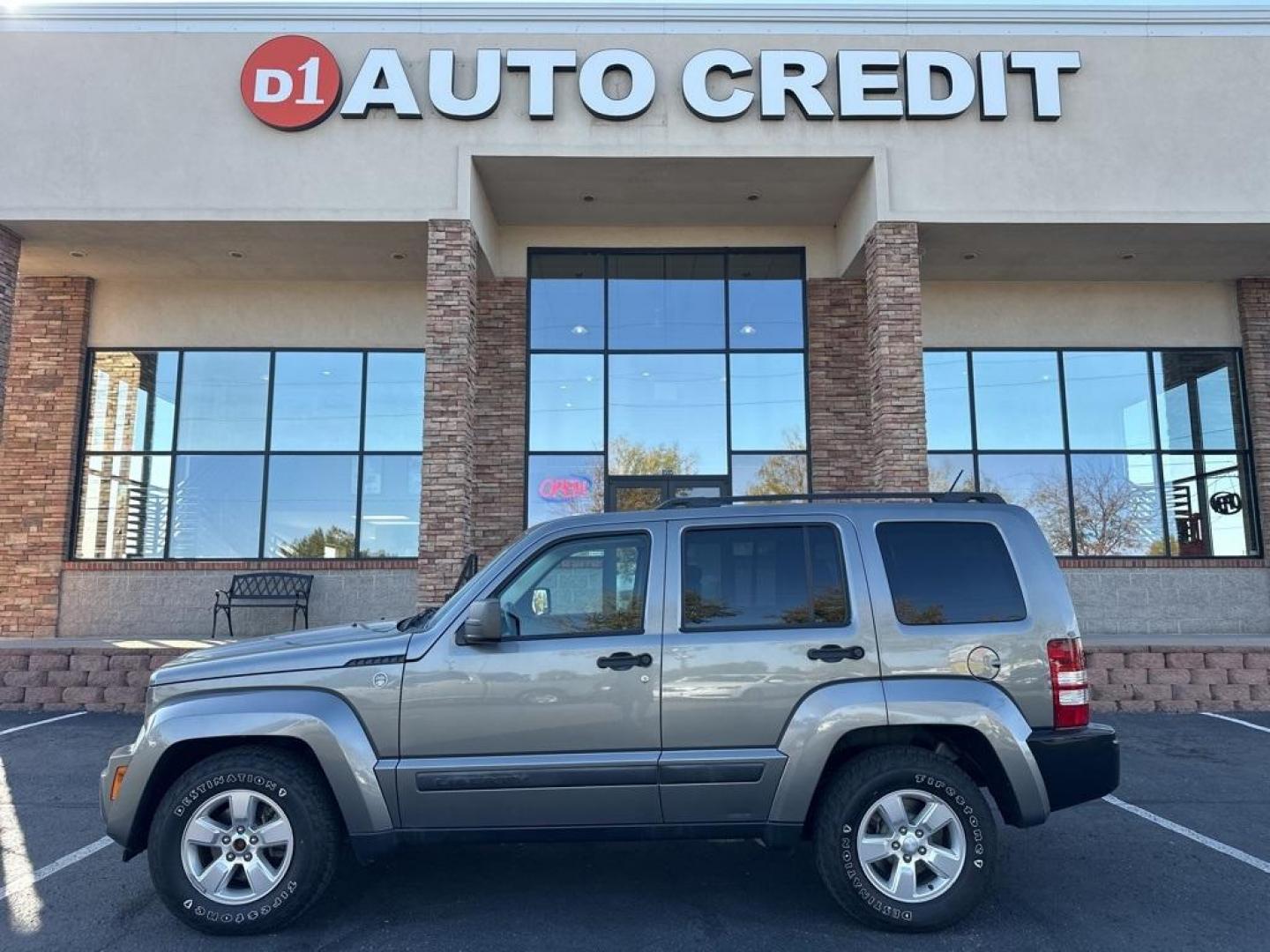 2012 Mineral Gray Metallic Clearcoat /Dark Slate Gray Interior Jeep Liberty Sport (1C4PJMAK0CW) with an PowerTech 3.7L V6 engine, Automatic transmission, located at 8595 Washington St., Thornton, CO, 80229, (303) 287-5511, 39.852348, -104.978447 - 2012 Jeep Liberty<br><br>D1 Auto NEVER charges dealer fees! All cars have clean titles and have been inspected for mechanical issues. We have financing for everyone. Good credit, bad credit, first time buyers.<br>Clean CARFAX. Odometer is 19891 miles below market average!<br>Please call Lakewood Loc - Photo#0