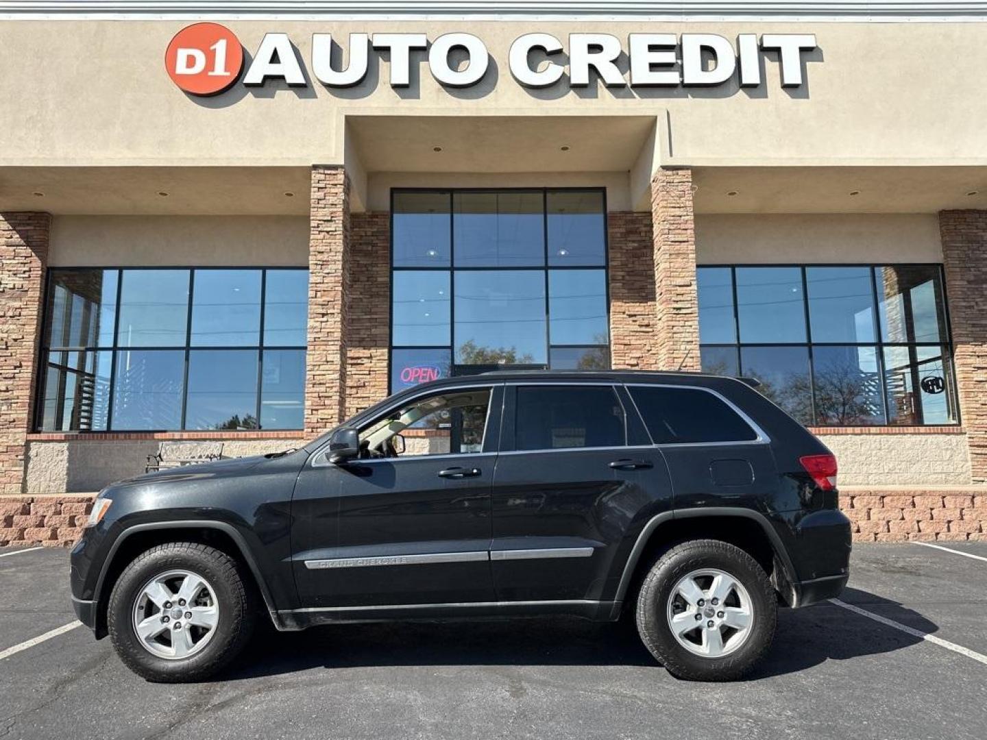 2013 Brilliant Black Crystal Pearlcoat /Dark Graystone/Medium Graystone Jeep Grand Cherokee Laredo (1C4RJFAG1DC) with an 3.6L V6 Flex Fuel 24V VVT engine, Automatic transmission, located at 8595 Washington St., Thornton, CO, 80229, (303) 287-5511, 39.852348, -104.978447 - 2013 Jeep Grand Cherokee<br><br>D1 Auto NEVER charges dealer fees! All cars have clean titles and have been inspected for mechanical issues. We have financing for everyone. Good credit, bad credit, first time buyers.<br>CARFAX One-Owner. Odometer is 6745 miles below market average!<br>Please call La - Photo#0