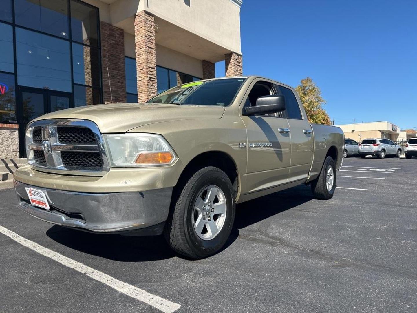 2011 White Gold Clearcoat /Dark Slate/Medium Graystone Ram 1500 SLT (1D7RV1GT8BS) with an HEMI 5.7L V8 Multi Displacement VVT engine, Automatic transmission, located at 8595 Washington St., Thornton, CO, 80229, (303) 287-5511, 39.852348, -104.978447 - 2011 Ram 1500<br><br>D1 Auto NEVER charges dealer fees! All cars have clean titles and have been inspected for mechanical issues. We have financing for everyone. Good credit, bad credit, first time buyers.<br><br>Please call Lakewood Location 303-274-7692 or Thornton 303-287-5511 to schedule a test - Photo#1