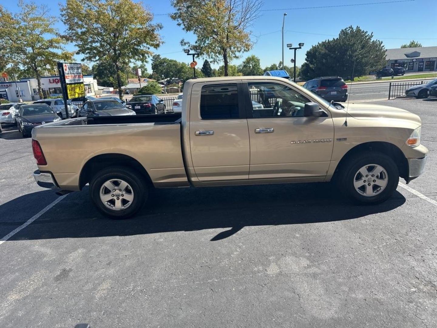 2011 White Gold Clearcoat /Dark Slate/Medium Graystone Ram 1500 SLT (1D7RV1GT8BS) with an HEMI 5.7L V8 Multi Displacement VVT engine, Automatic transmission, located at 8595 Washington St., Thornton, CO, 80229, (303) 287-5511, 39.852348, -104.978447 - 2011 Ram 1500<br><br>D1 Auto NEVER charges dealer fees! All cars have clean titles and have been inspected for mechanical issues. We have financing for everyone. Good credit, bad credit, first time buyers.<br><br>Please call Lakewood Location 303-274-7692 or Thornton 303-287-5511 to schedule a test - Photo#4