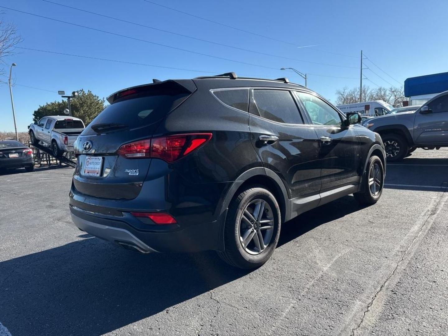 2017 Twilight Black /Gray Hyundai Santa Fe Sport 2.4 Premium Plus (5NMZUDLB7HH) with an 2.4L I4 DGI DOHC 16V engine, Automatic transmission, located at 8595 Washington St., Thornton, CO, 80229, (303) 287-5511, 39.852348, -104.978447 - 2017 Hyundai Santa Fe Sport AWD All Cars Have Clean Titles And Are Serviced Before Sale., Clean Carfax, No Accident, Blind Spot Monitoring, Backup Camera, Leather, Heated Seats, Bluetooth/ With Bluetooth Audio, Non Smoker, No Pet Odor Or Hair, Santa Fe Sport 2.4 Premium Plus, AWD, 2.4L Popular Equip - Photo#4