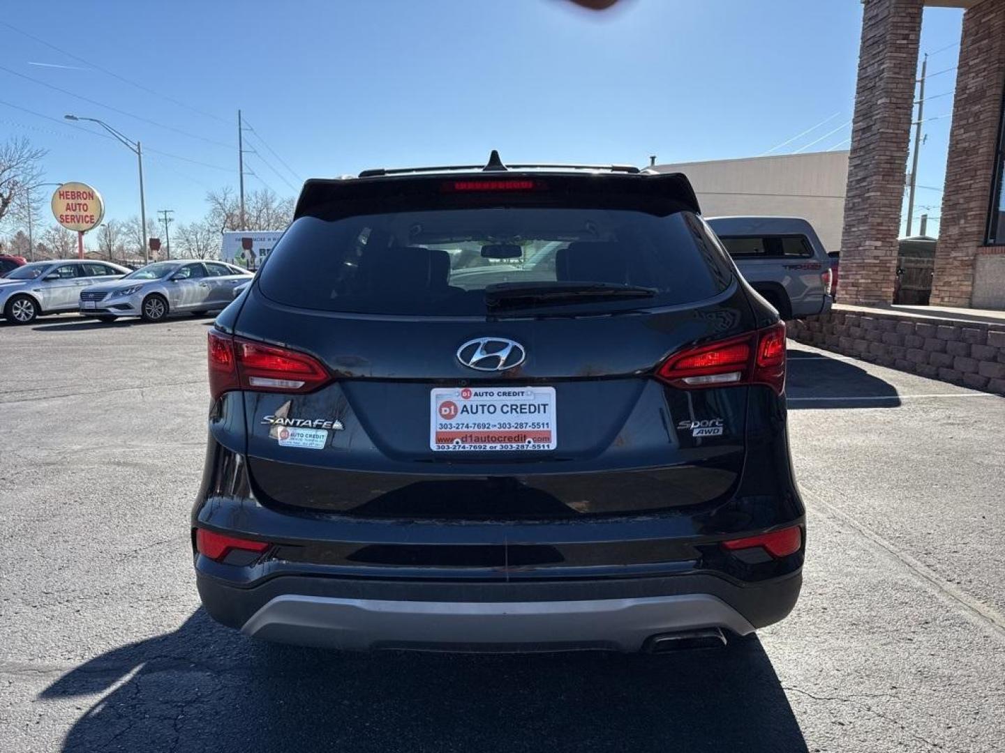 2017 Twilight Black /Gray Hyundai Santa Fe Sport 2.4 Premium Plus (5NMZUDLB7HH) with an 2.4L I4 DGI DOHC 16V engine, Automatic transmission, located at 8595 Washington St., Thornton, CO, 80229, (303) 287-5511, 39.852348, -104.978447 - 2017 Hyundai Santa Fe Sport AWD All Cars Have Clean Titles And Are Serviced Before Sale., Clean Carfax, No Accident, Blind Spot Monitoring, Backup Camera, Leather, Heated Seats, Bluetooth/ With Bluetooth Audio, Non Smoker, No Pet Odor Or Hair, Santa Fe Sport 2.4 Premium Plus, AWD, 2.4L Popular Equip - Photo#5