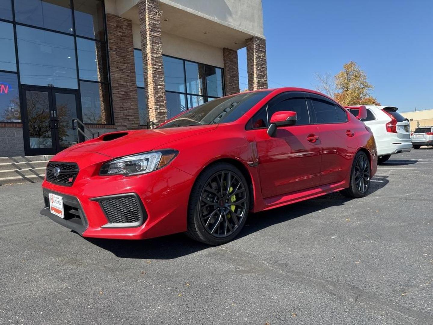 2019 Pure Red /Black/Carbon Black Subaru WRX STi (JF1VA2S64K9) with an 2.5L DOHC Intercooled High Boost Turbocharged engine, Manual transmission, located at 8595 Washington St., Thornton, CO, 80229, (303) 287-5511, 39.852348, -104.978447 - 2019 Subaru WRX STI with low miles and in excellent condition insdie and out!<br>All Cars Have Clean Titles And Are Serviced Before Sale.Apple/Android Car Play, Blind Spot Monitoring, Backup Camera, Leather, Heated Seats, Bluetooth/ With Bluetooth Audio, Non Smoker, No Pet Odor Or Hair, WRX STi, Clo - Photo#0