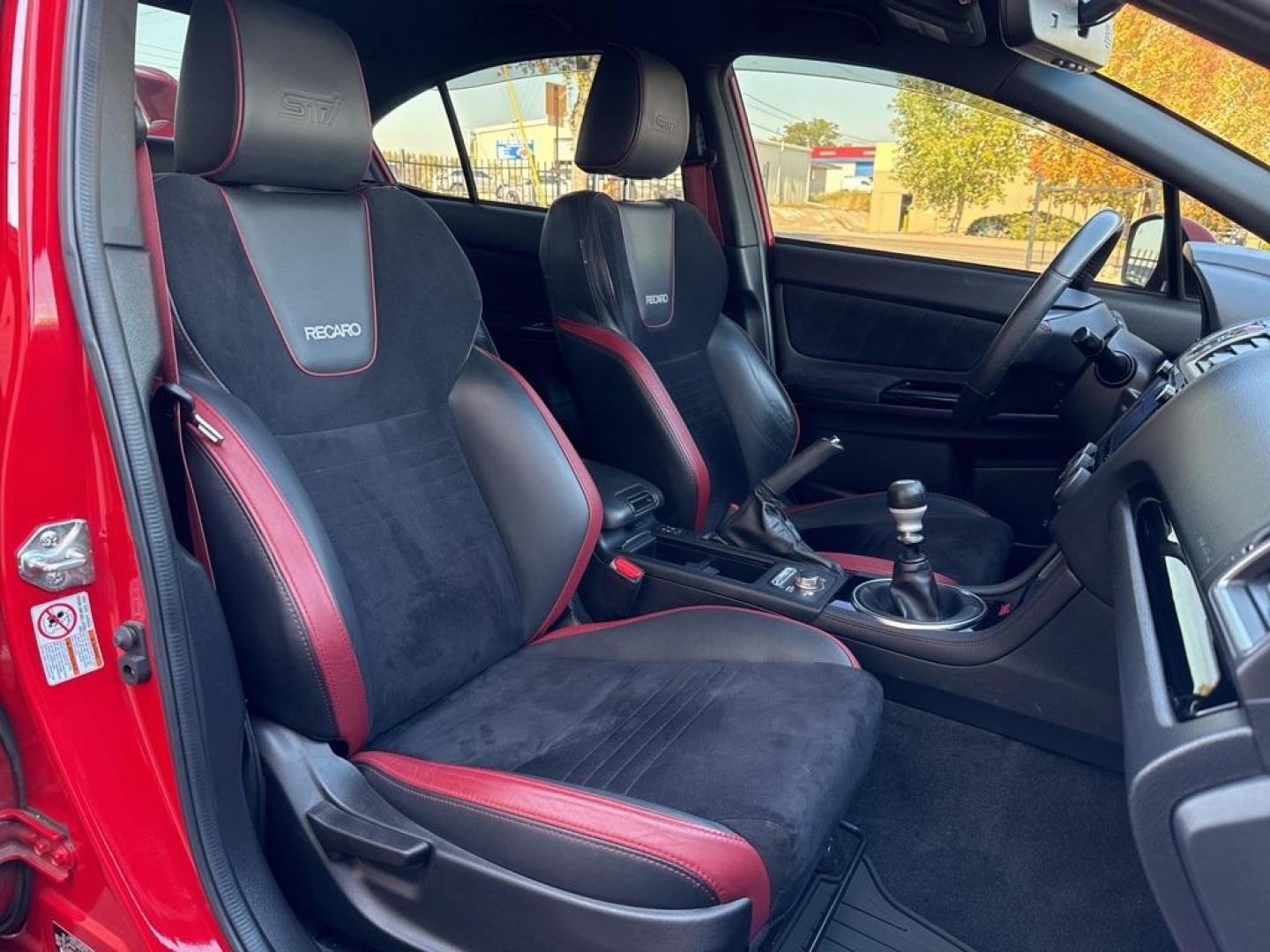 2019 Pure Red /Black/Carbon Black Subaru WRX STi (JF1VA2S64K9) with an 2.5L DOHC Intercooled High Boost Turbocharged engine, Manual transmission, located at 8595 Washington St., Thornton, CO, 80229, (303) 287-5511, 39.852348, -104.978447 - 2019 Subaru WRX STI with low miles and in excellent condition insdie and out!<br>All Cars Have Clean Titles And Are Serviced Before Sale.Apple/Android Car Play, Blind Spot Monitoring, Backup Camera, Leather, Heated Seats, Bluetooth/ With Bluetooth Audio, Non Smoker, No Pet Odor Or Hair, WRX STi, Clo - Photo#11